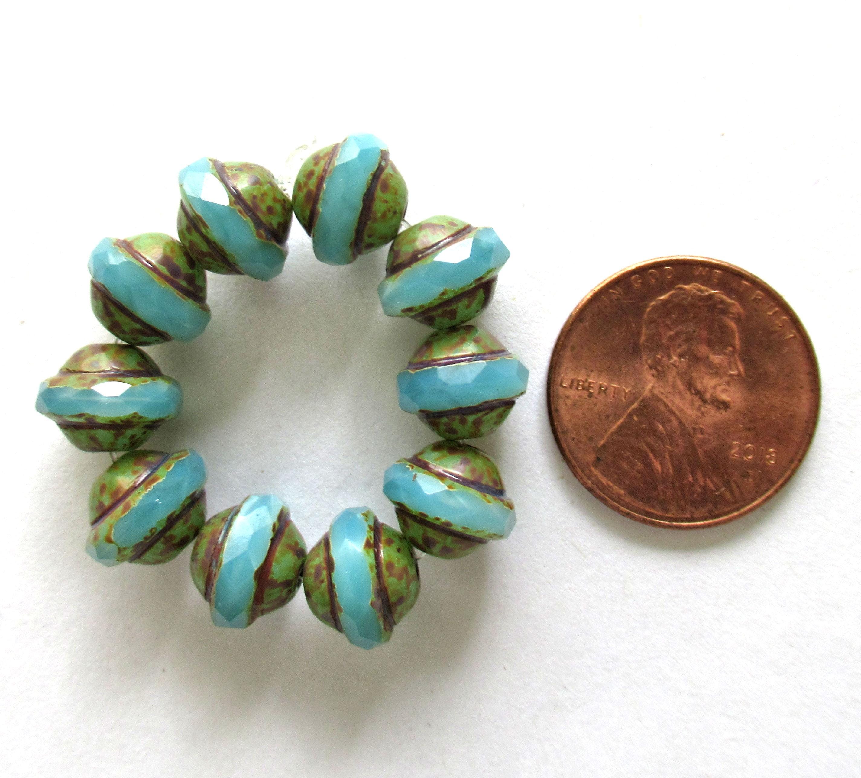 Ten Czech glass saturn or saucer beads - 8 x 10mm translucent sky blue opal faceted beads with a picasso finish - C00651