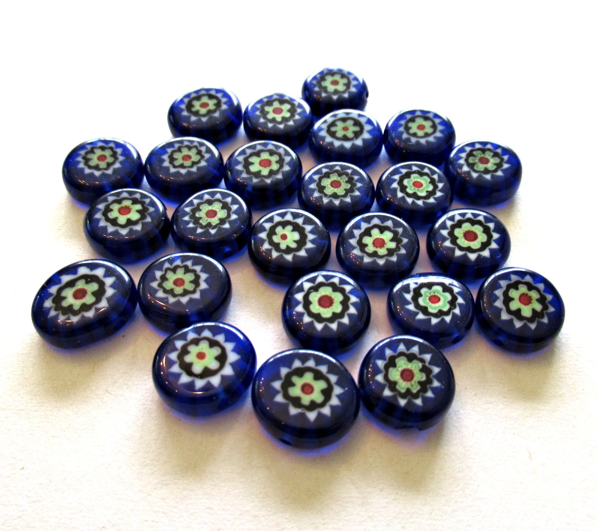 Ten 10mm cane or millefiori glass beads - cobal blue, green and red coin or disc beads - C0095