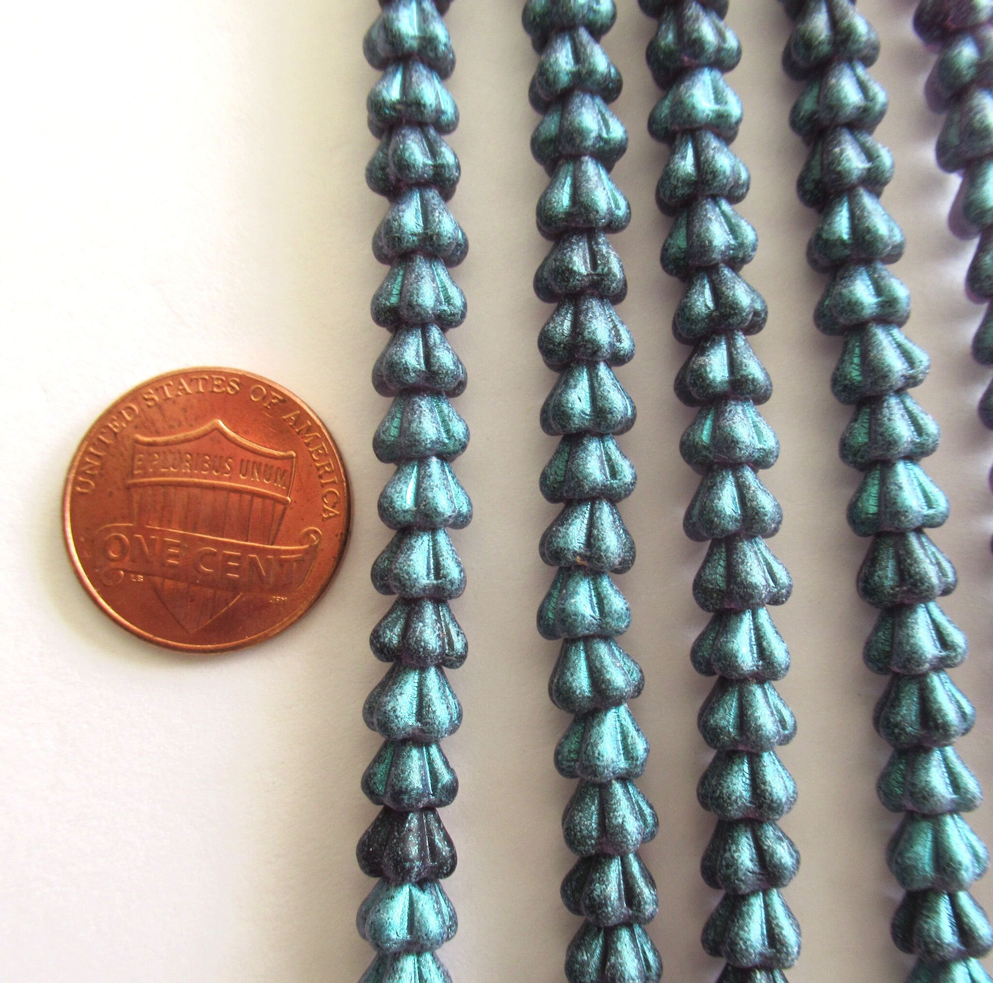 Lot of 50 6mm x 4mm Czech glass baby bell flower beads - green glow tanzanite flower beads - 0069