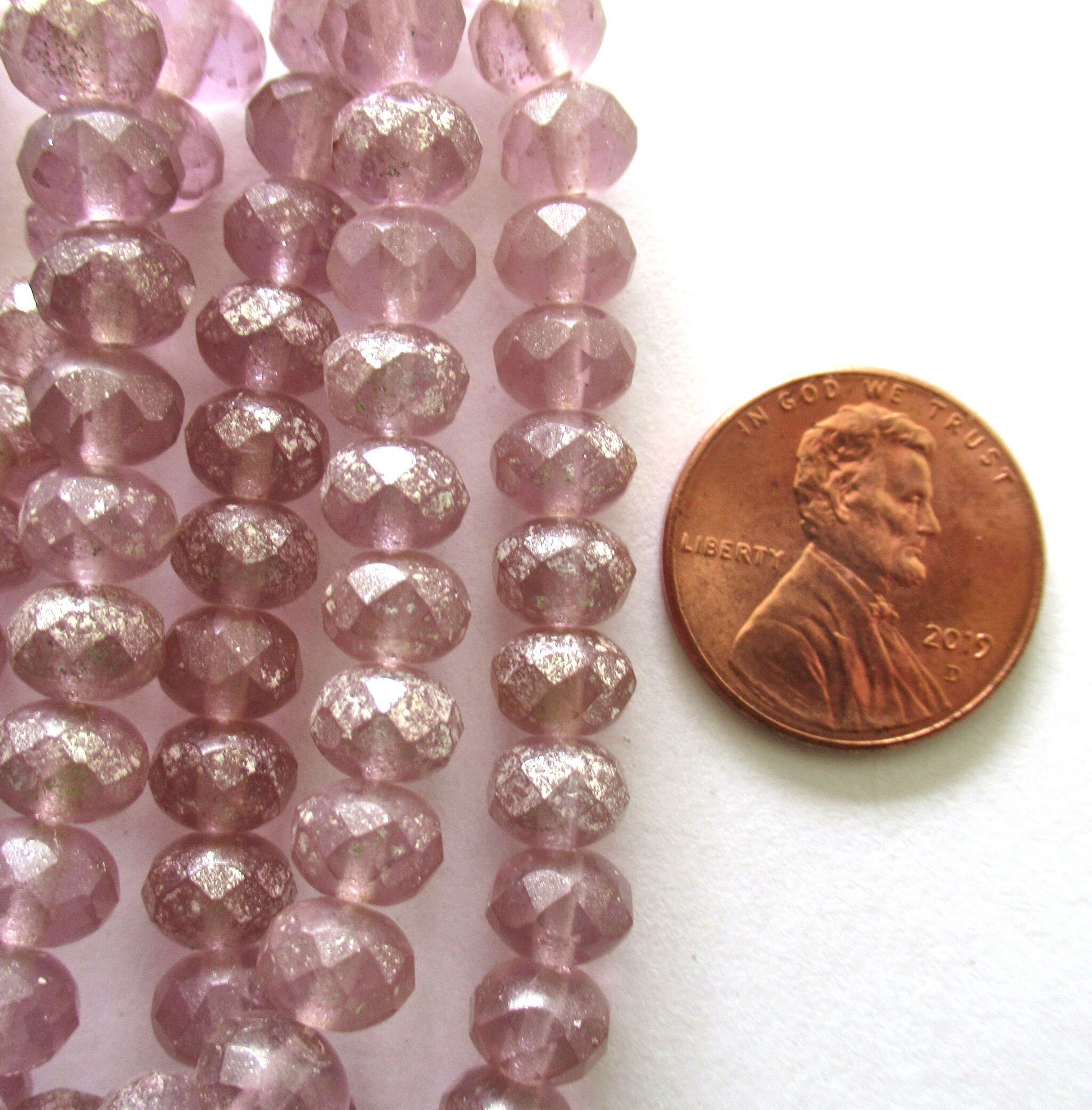 Lot of 25 Czech glass puffy rondelle beads - transparent light purple / lavender w/ silver mercury finish faceted 5 x 7mm rondelles C00361