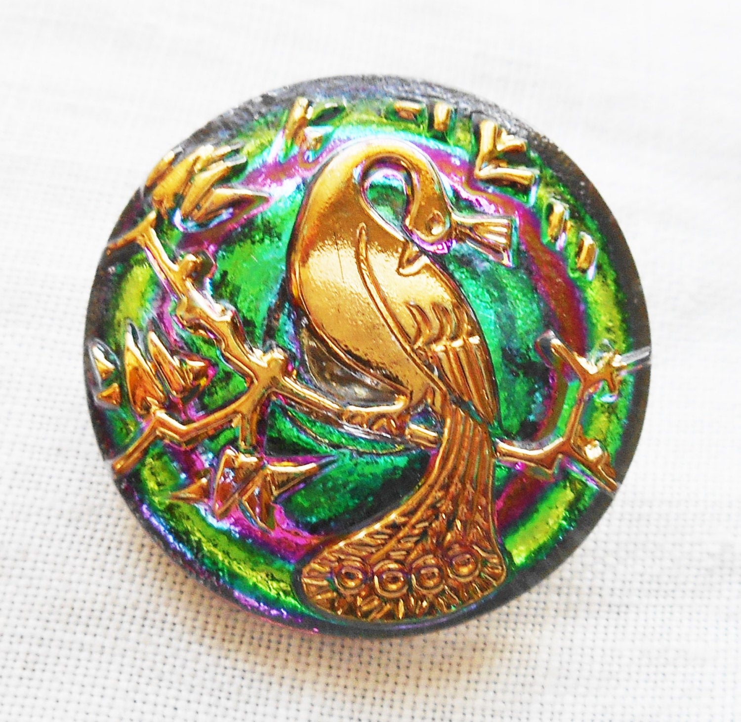 One 22mm Czech translucent green and gold glass peacock button with pink accents, decorative shank buttons C05201