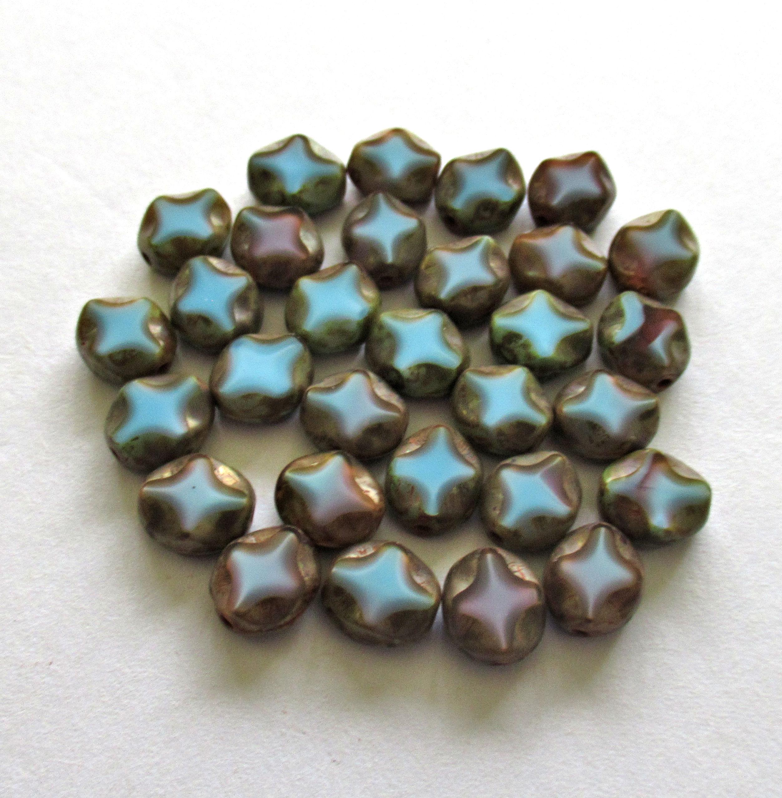 15 Czech glass oval beads - 9 x 8mm - blue w/ some purple & a Picasso finish - carved table cut beads with a diamond pattern - C0251