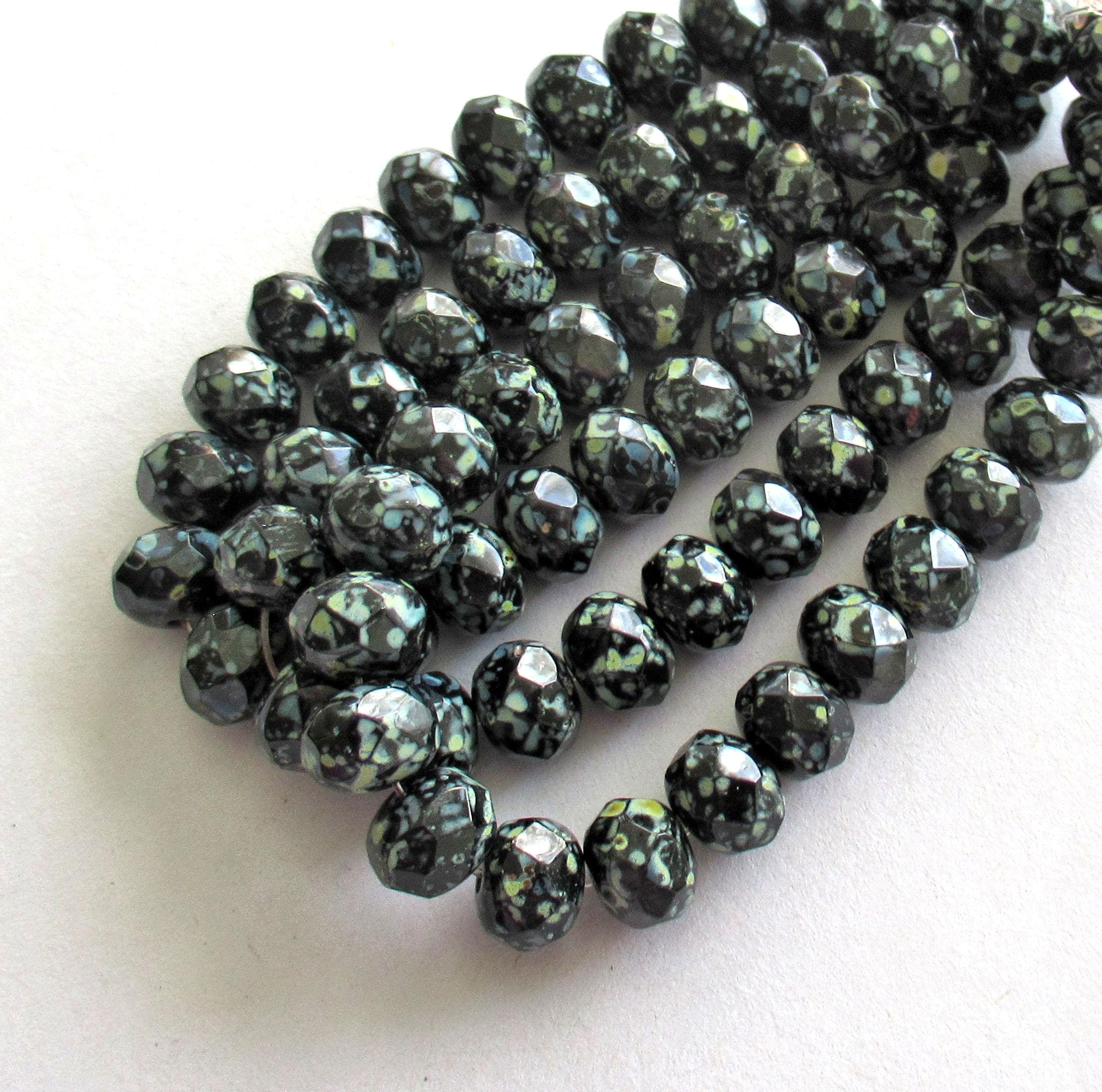 25 Czech glass puffy rondelles - 6 x 8mm jet black with a full picasso coat - faceted fire polished donut beads - C00591