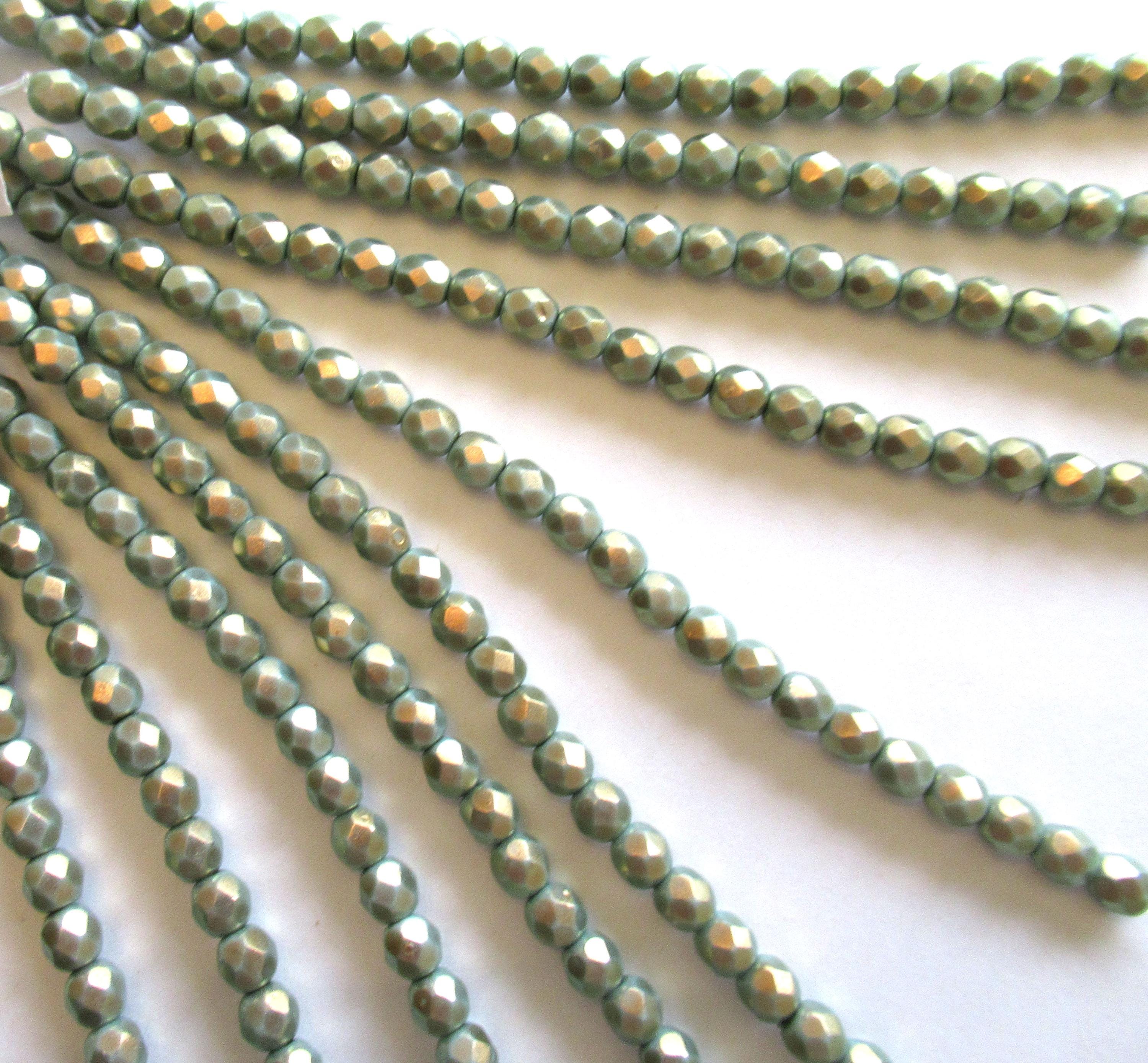 25 6mm Czech glass round beads - Halo Ethereal Heavens opaque light green beads w/ gold finish - fire polished, faceted - C0087