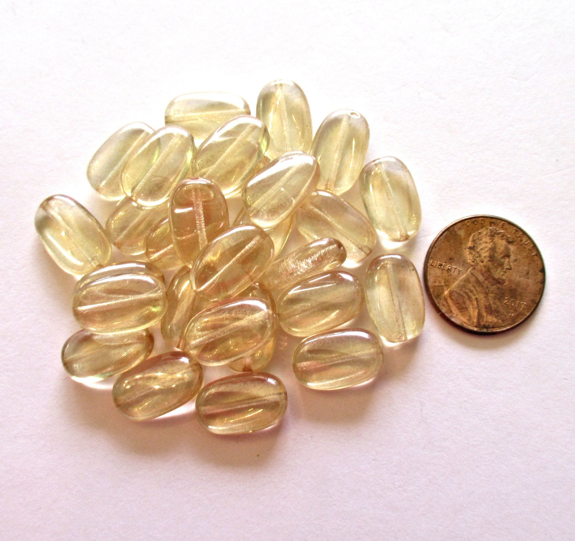 Lot of 15 slightly twisted oval Czech glass beads - 14mm x 8mm champagne - pressed glass beads C0062