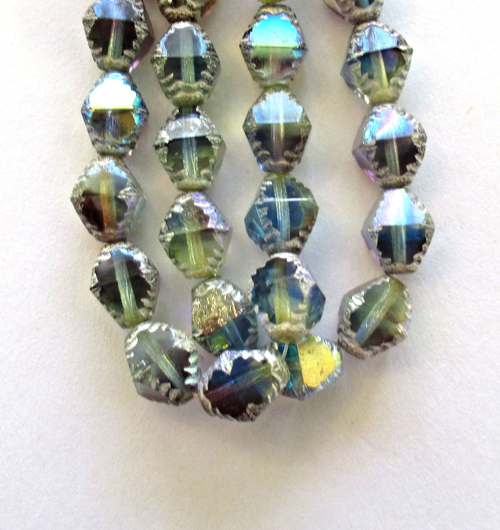 Fifteen Czech glass bicones - 10 x 8mm color mix ab w/ silver accents - table cut carved notched bicone beads - C00542