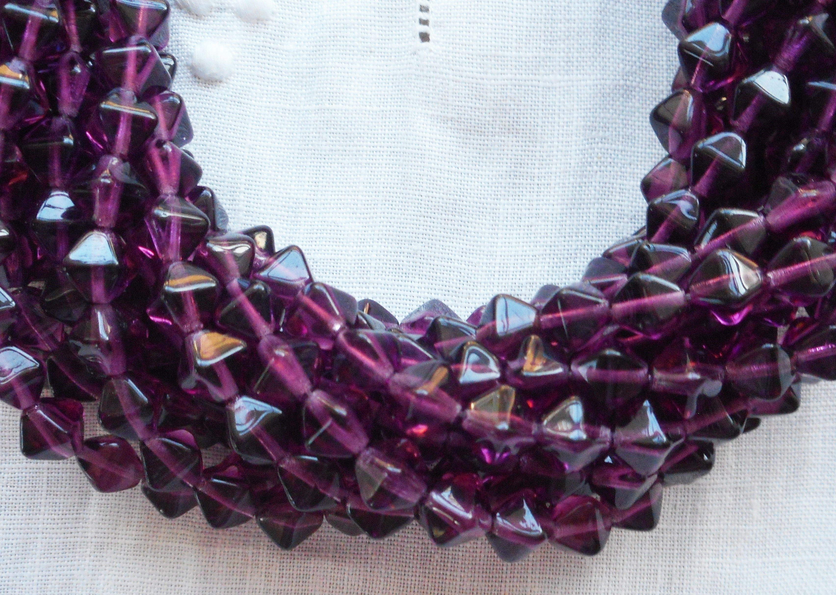 Fifty 6mm Amethyst bicones, Purple pressed glass Czech bicone beads C7501