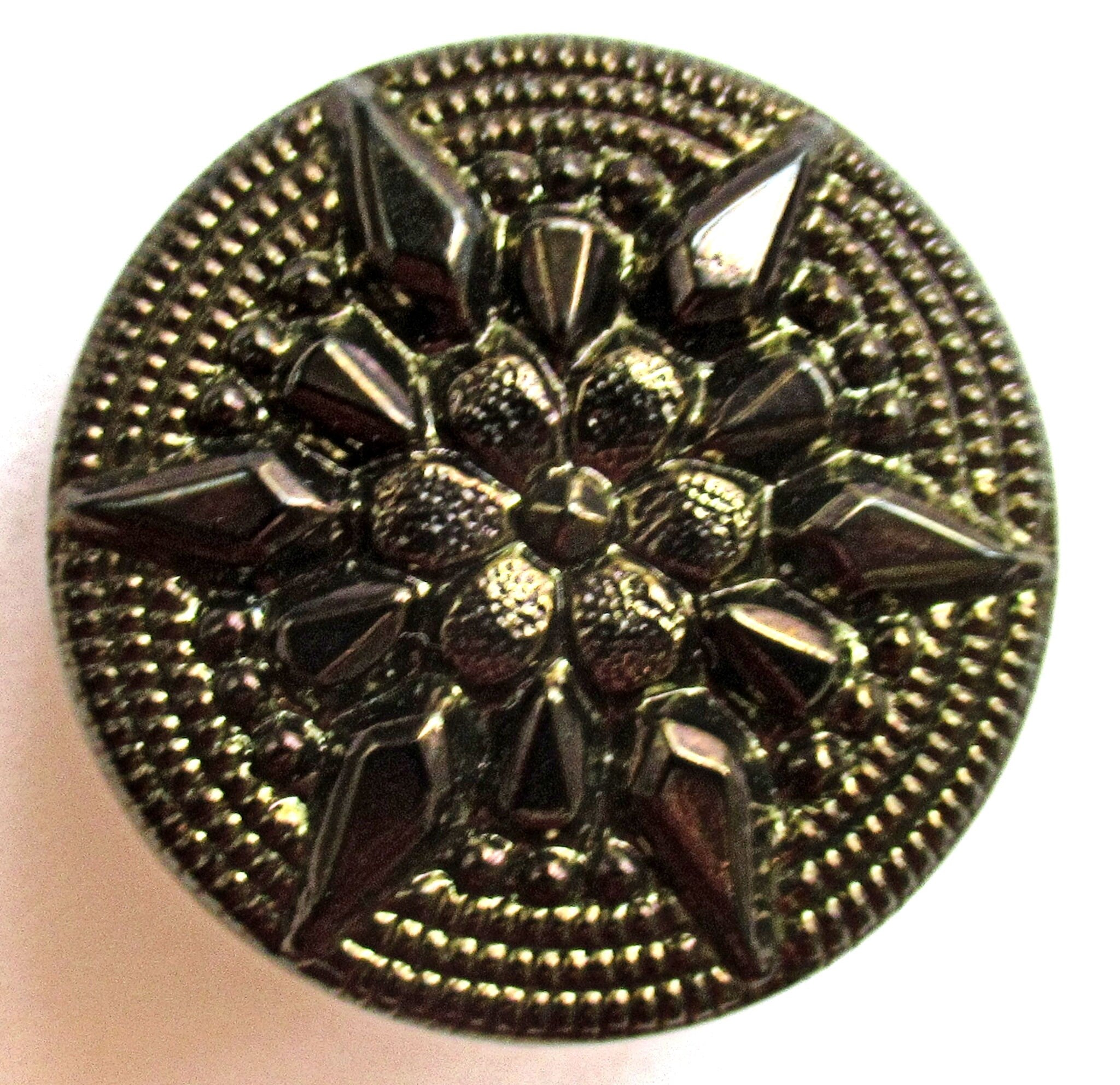 One 27mm Czech glass button, dark brown metallic luster with a raised star pattern, a decorative shank button 08201