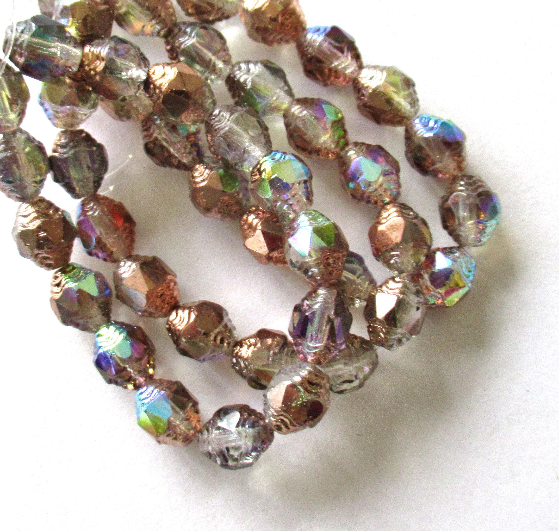 15 Czech glass mini antique style faceted oval cathedral beads - 8 x 6mm crystal clear beads with copper and rainbow ab finishes - C00071