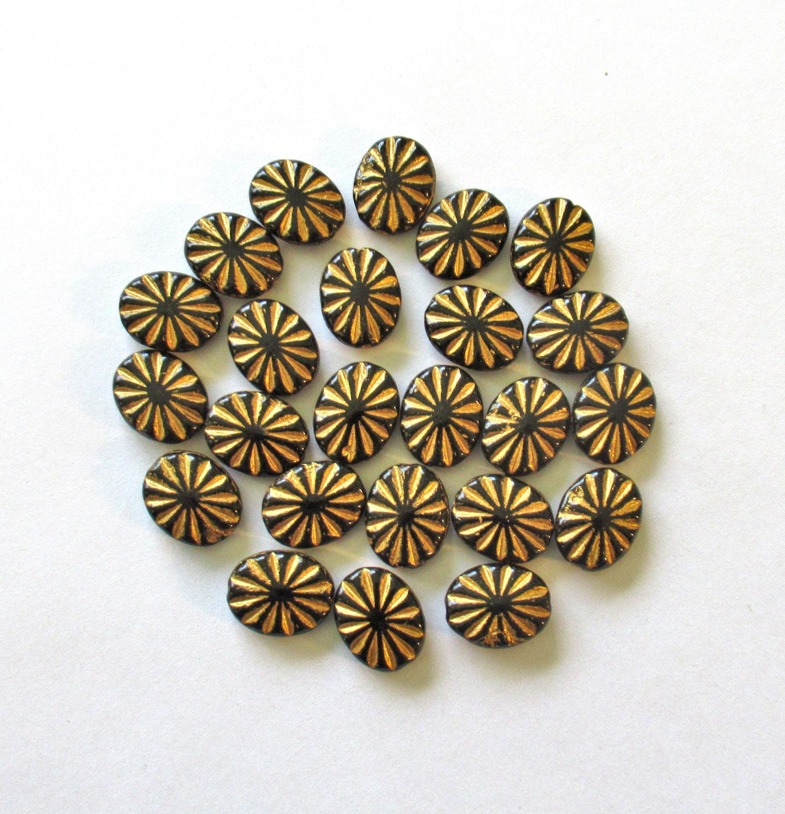 Czech glass oval beads - black beads with a gold wash - 14mm x 11mm - sun burst pressed glass beads - 8 beads - C0431