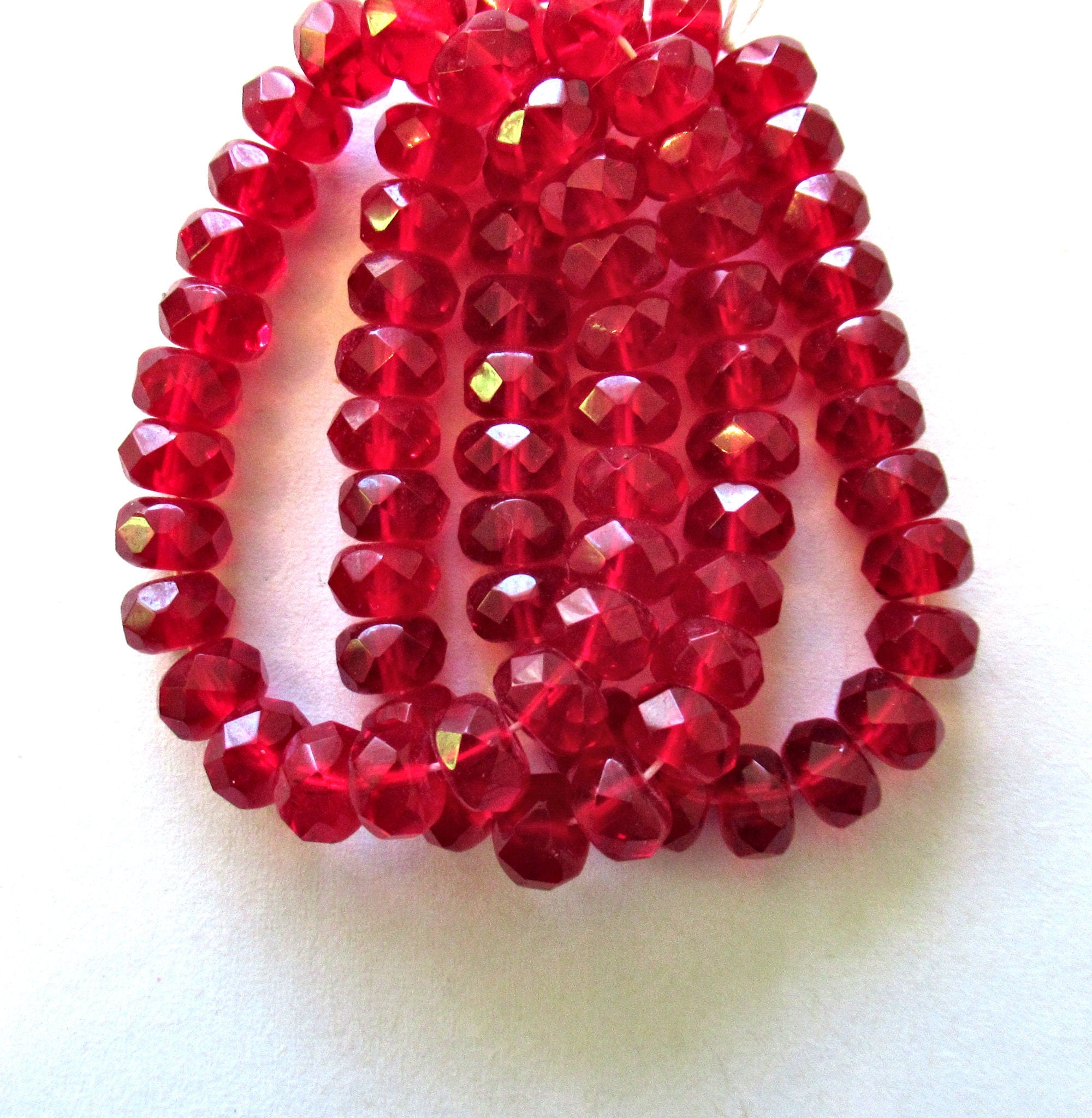 Lot of 25 Czech glass puffy rondelles - transparent ruby red / light garnet faceted rondelle or donut beads - 5 x 7mm - C00001