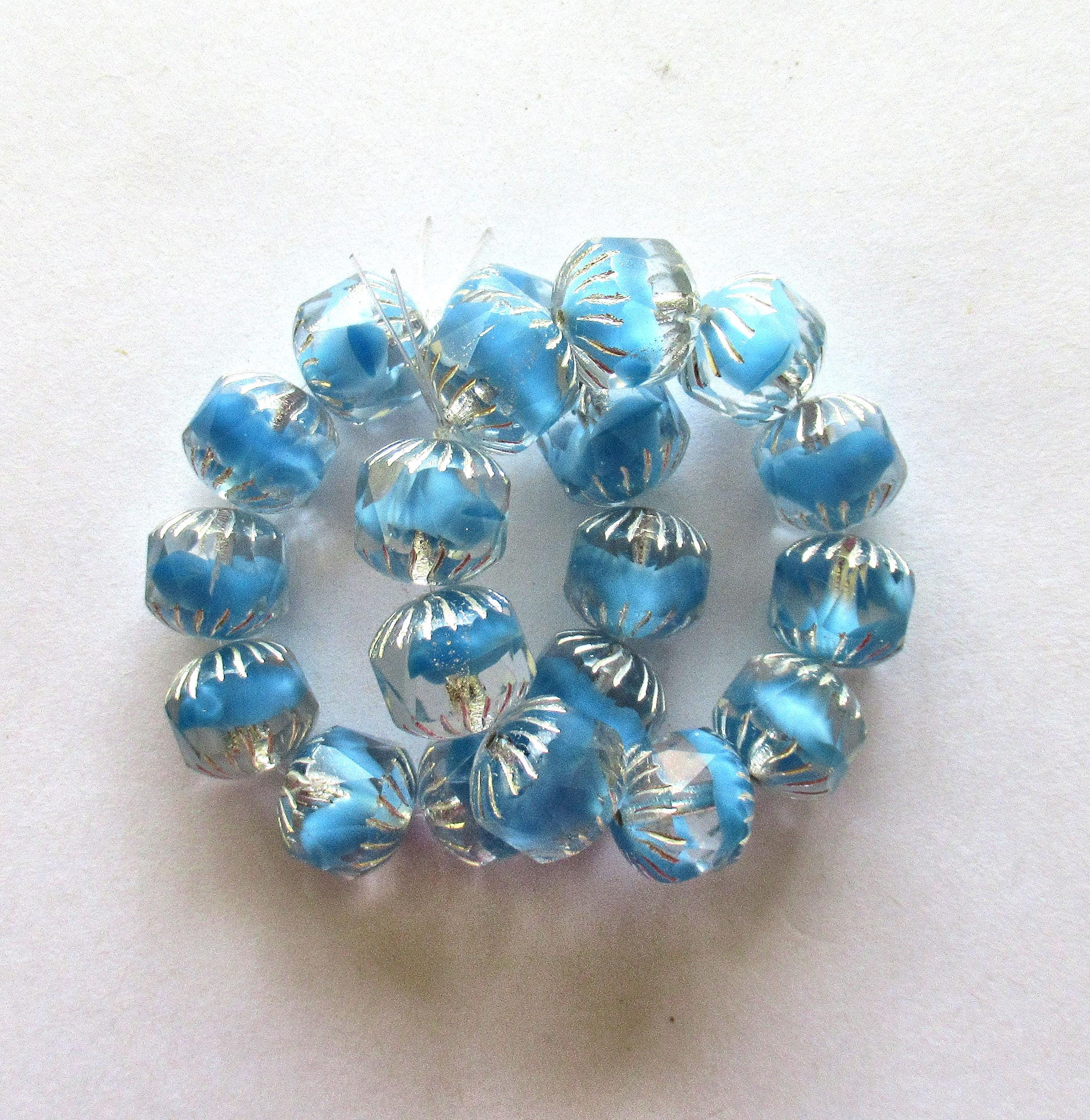 Ten Czech glass faceted carved cruller beads - 10mm - sky blue silk and crystal clear mix - cathedral beads w/ silver accents - 00024