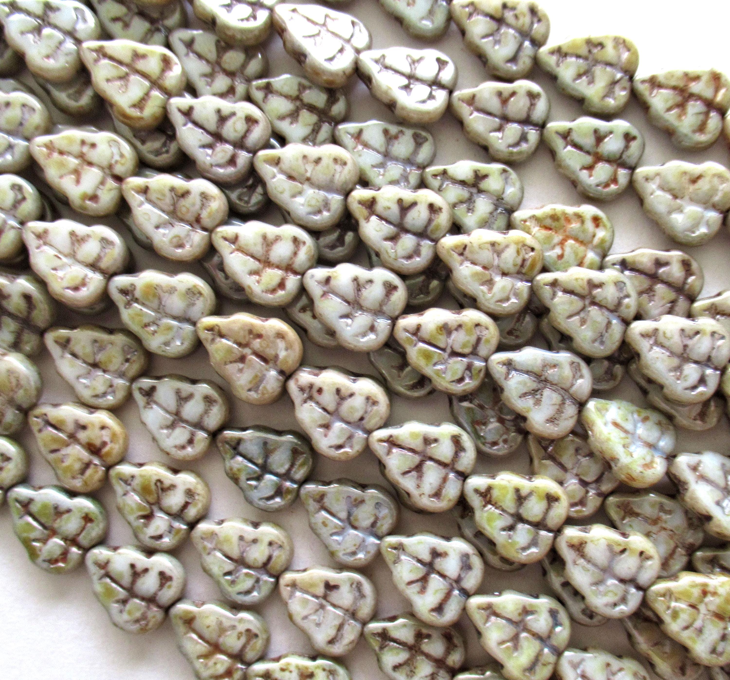 25 Czech glass leaf beads - opaque luster green picasso - 8 x 10mm leaves - C0006