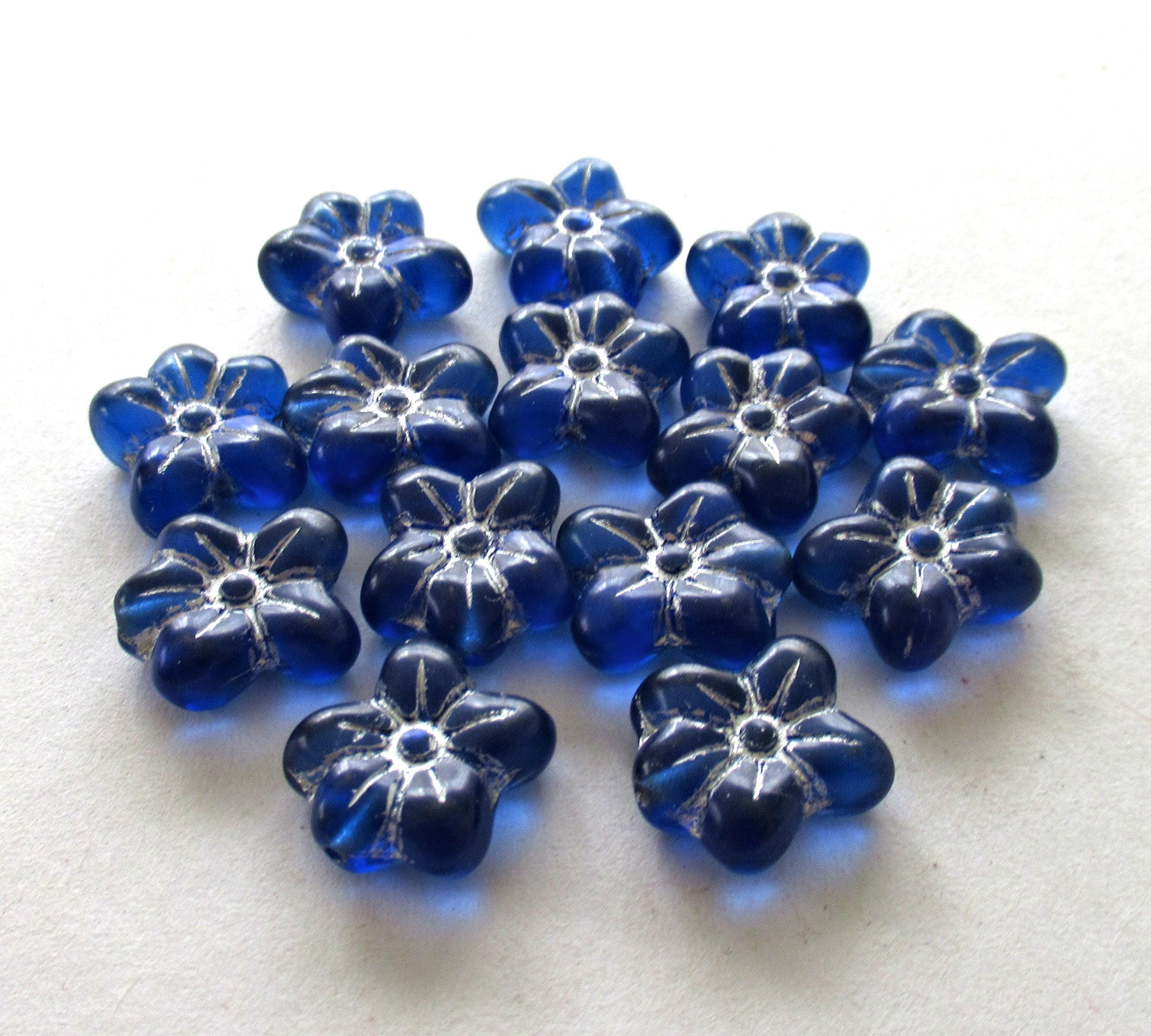 Ten Czech glass flower beads - 14 X 12mm - sapphire blue with silver accents asymmetrical pressed glass flowers - C00941