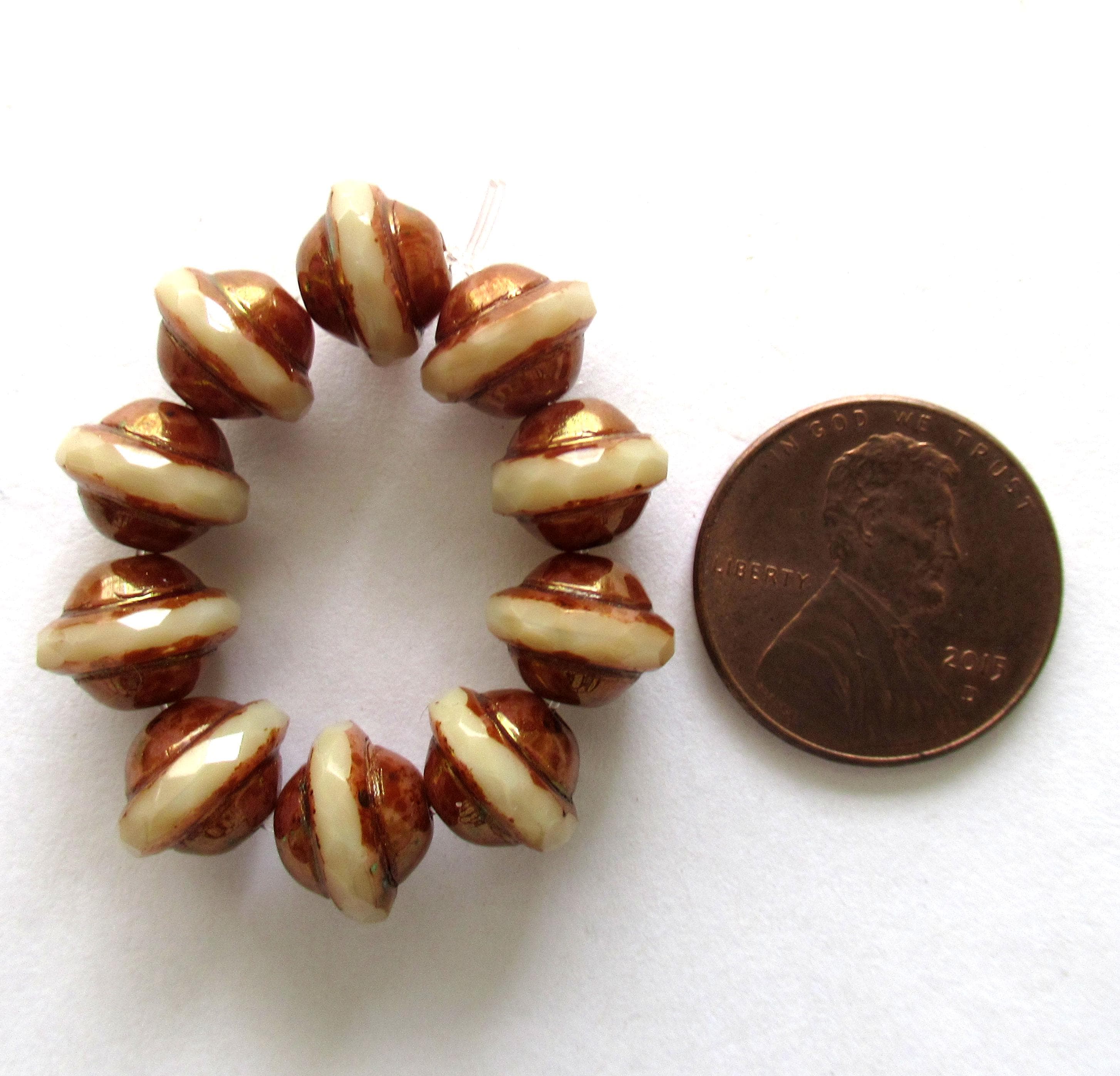 Ten Czech glass saturn beads - 8mm x 10mm - off white w/ bronze picasso accents - faceted fire polished saucer beads - C00002