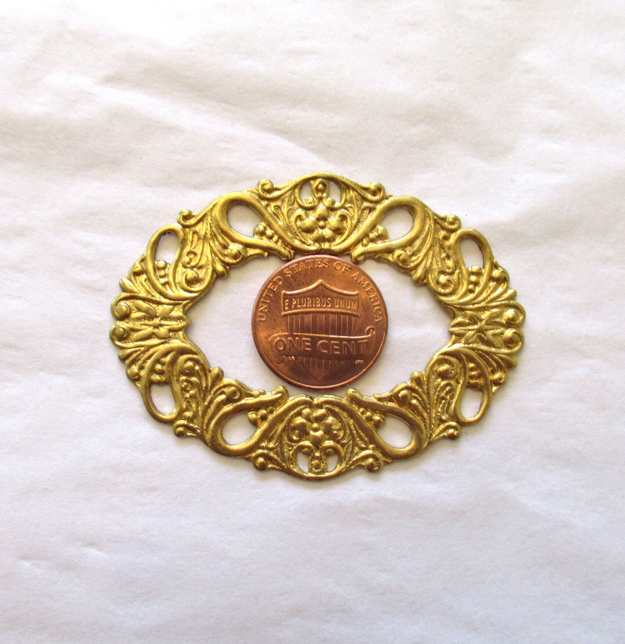 1 raw brass stamping - ornate oval wreath - connector ring - ornament - 55 x 42 mm - made in the USA C0078