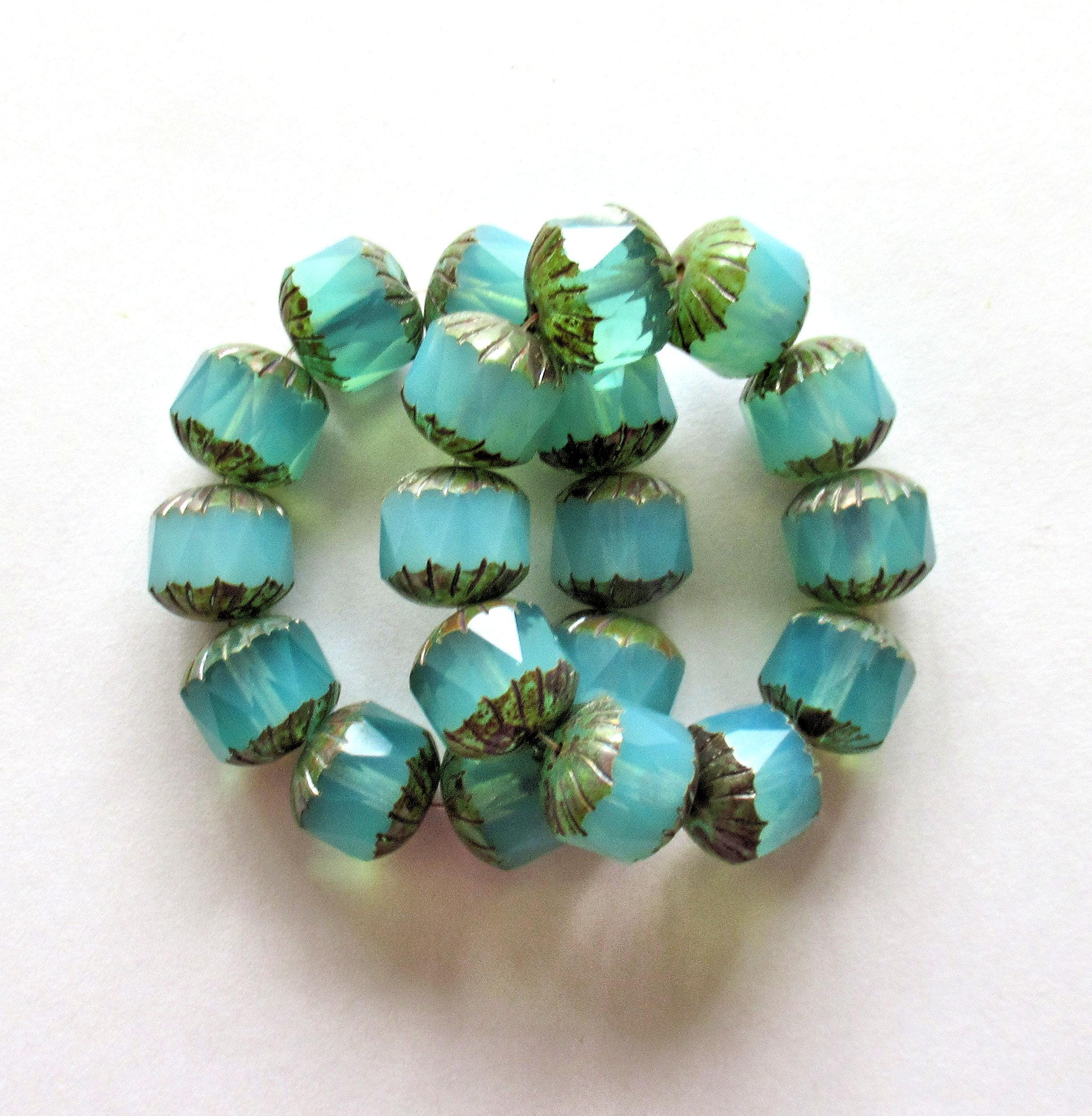 Ten Czech glass faceted carved cruller beads - 10mm - milky aqua blue opal Vaseline glass - cathedral beads w/ picasso accents - 00044