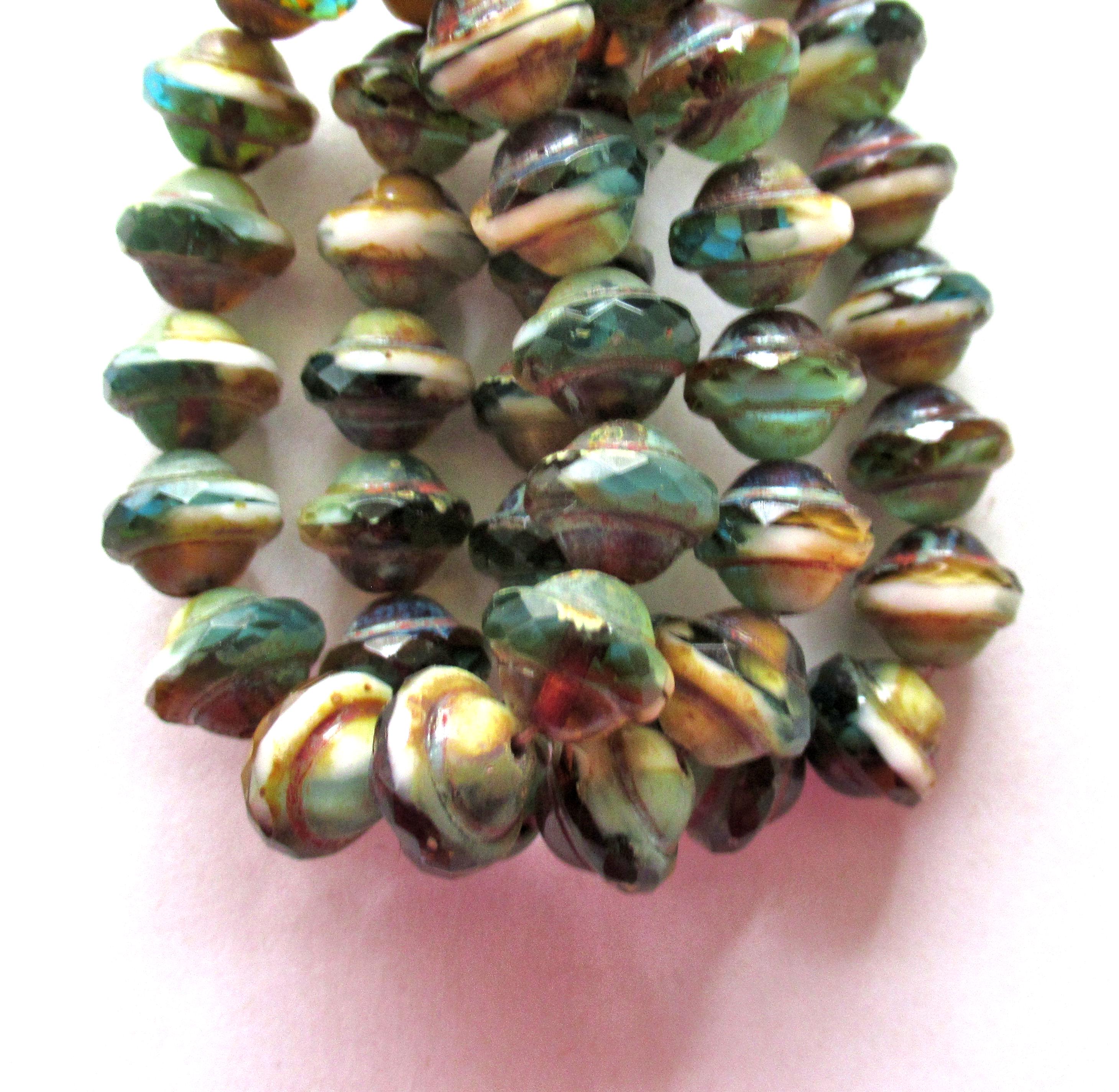 Fifteen Czech glass faceted saturn / saucer beads - 8 x 10mm - amber / blue green & white marbled mix with a picasso accents - C00302