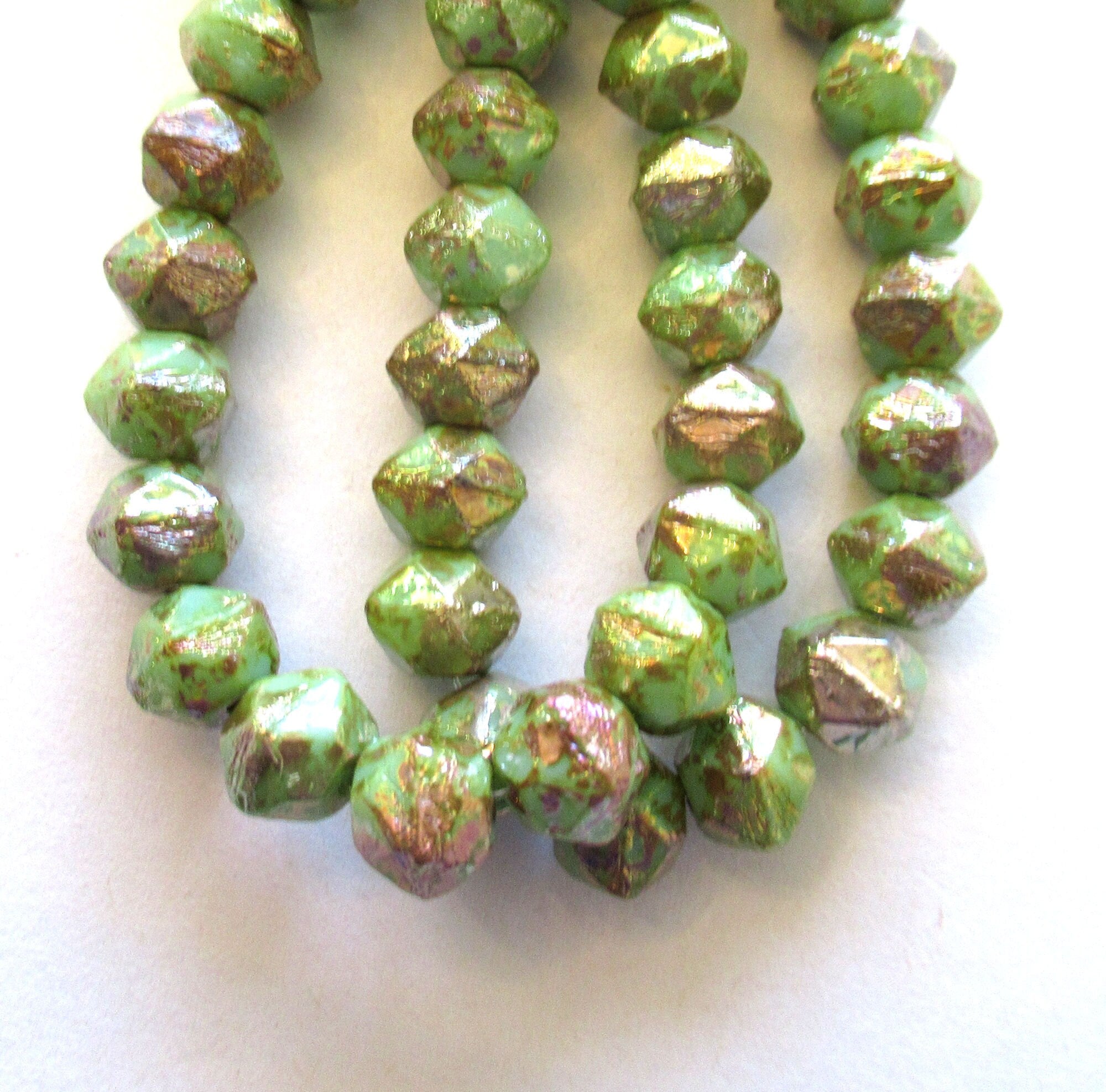 20 8mm Czech glass faceted English cut beads - green beads with a gold picasso finish - C00031