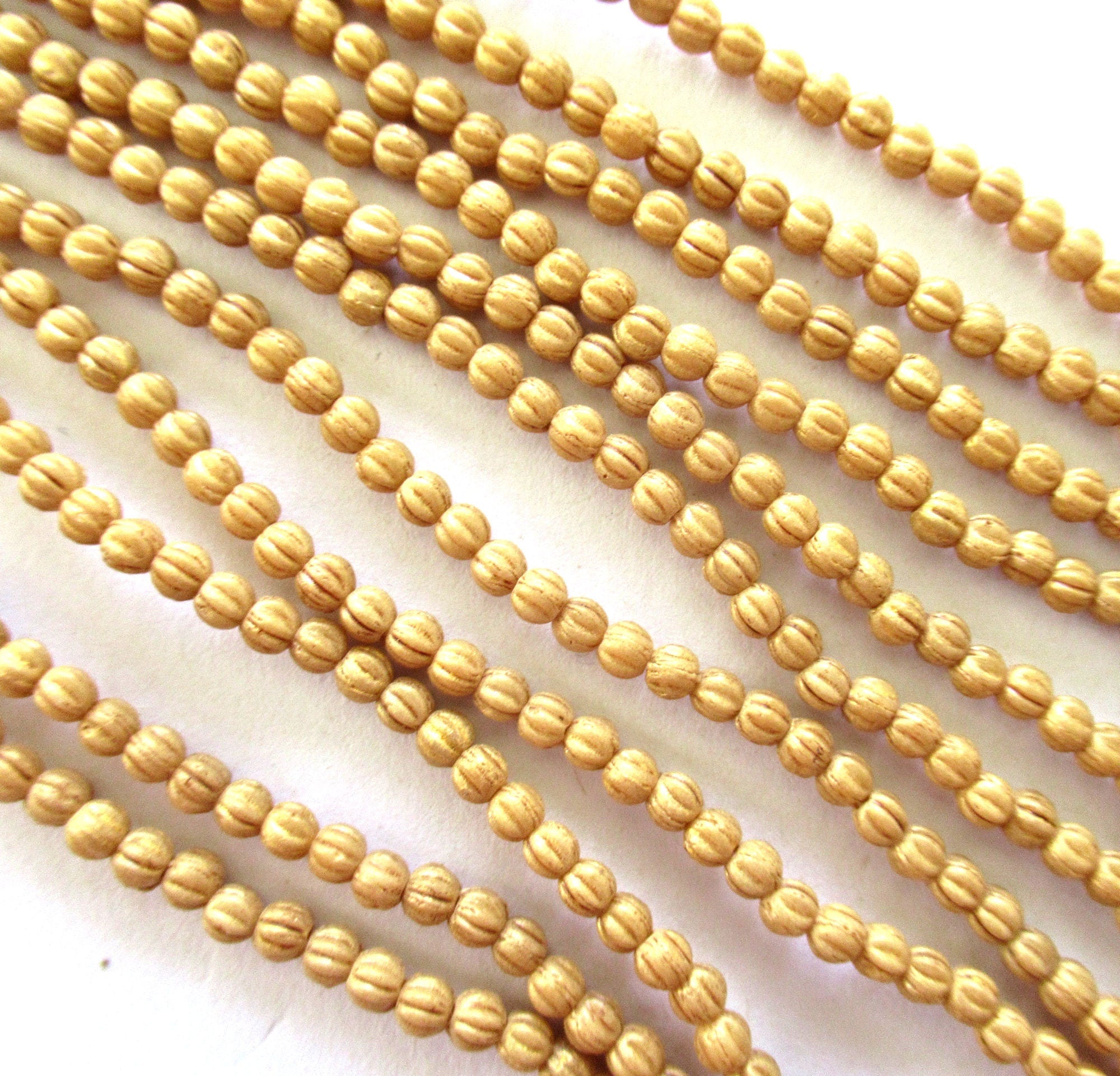 Lot of 100 3mm Czech glass melon beads - opaque beige, yellow / gold Pacifica Ginger pressed glass beads - C00101