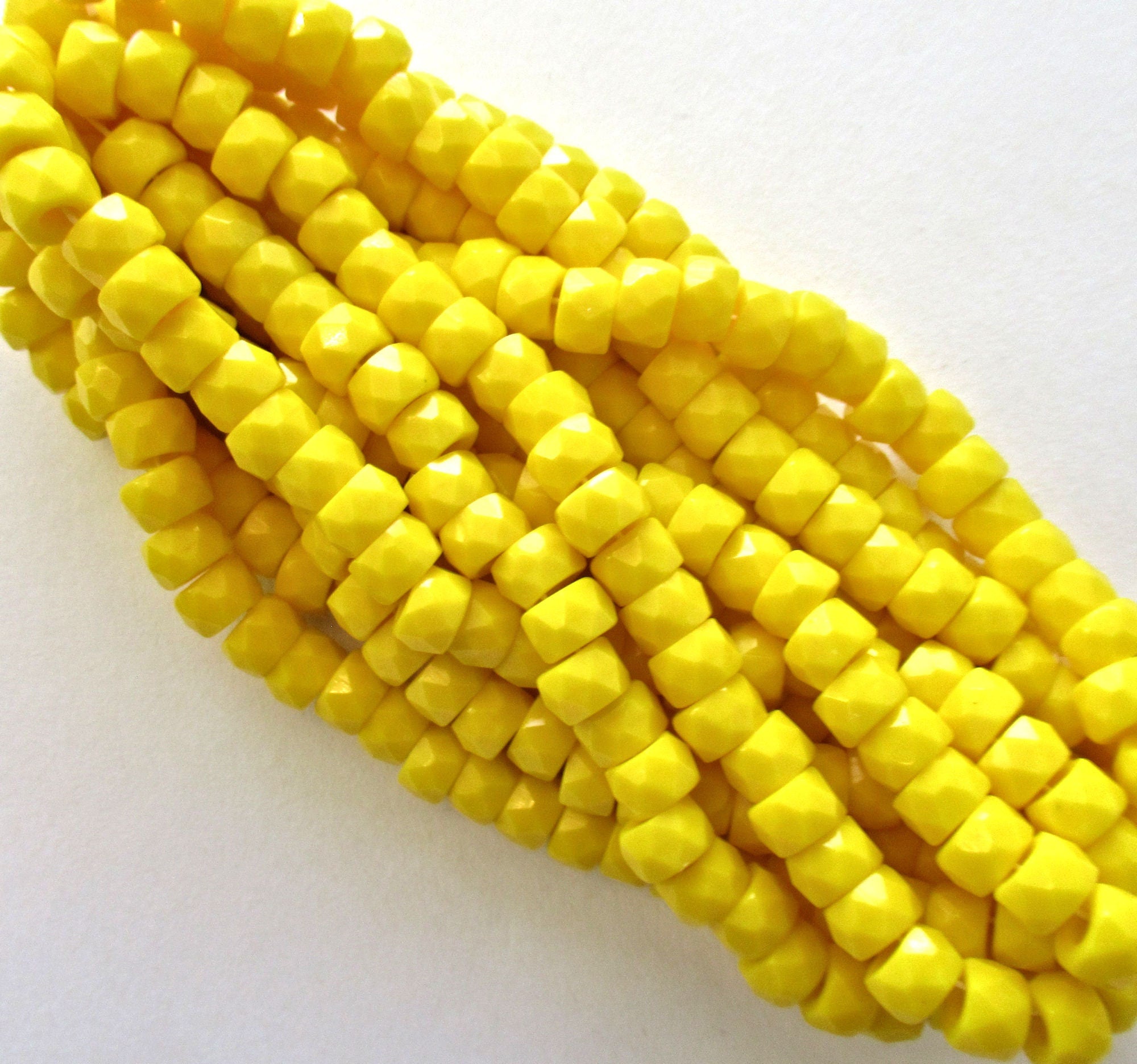 Lot of 50 6mm Czech glass faceted pony, roller or crow beads - bright opaque yellow large hole, fire polished beads C00111