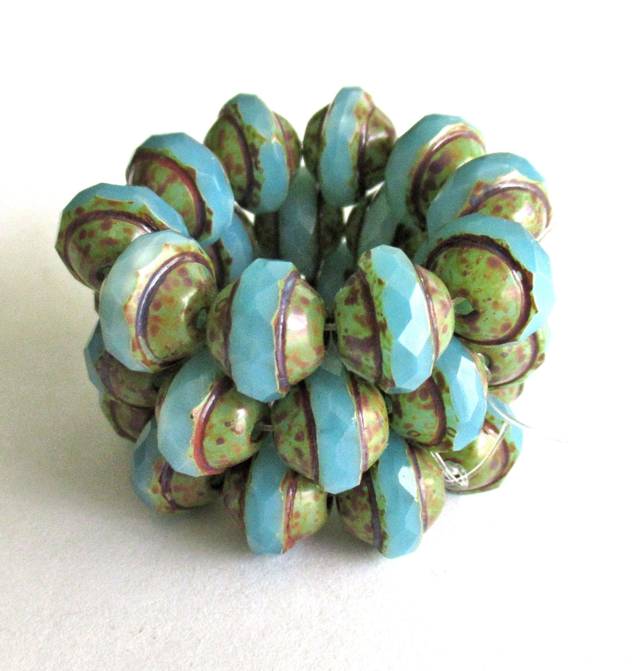 Ten Czech glass saturn or saucer beads - 8 x 10mm translucent sky blue opal faceted beads with a picasso finish - C00651