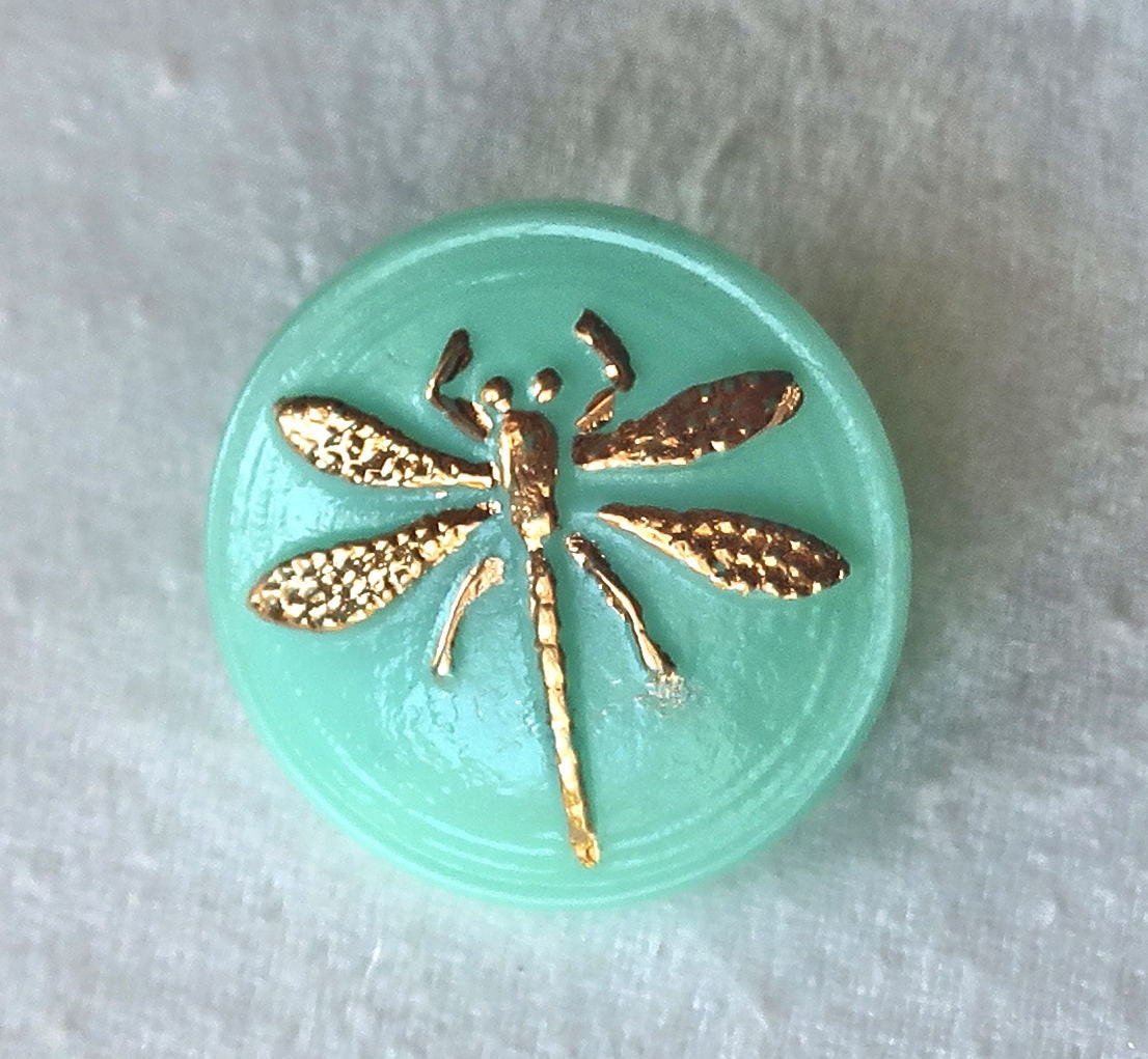 One 18mm Czech glass button, opaque mint green with a gold dragonfly decorative shank button 52201