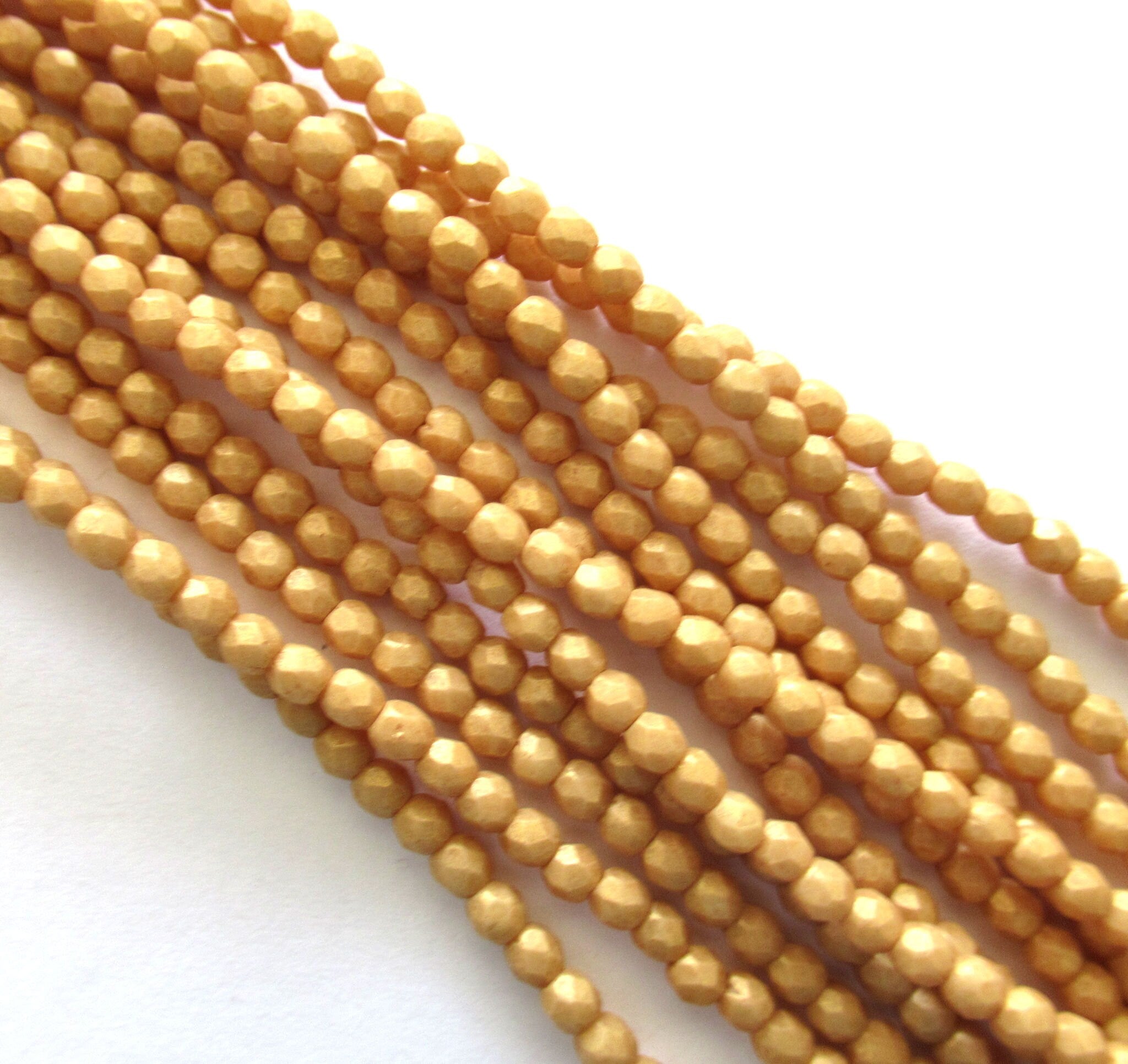 50 3mm Czech glass beads - faceted, fire polished neutral opaque beige, yellow / gold Pacifica Ginger beads C0085