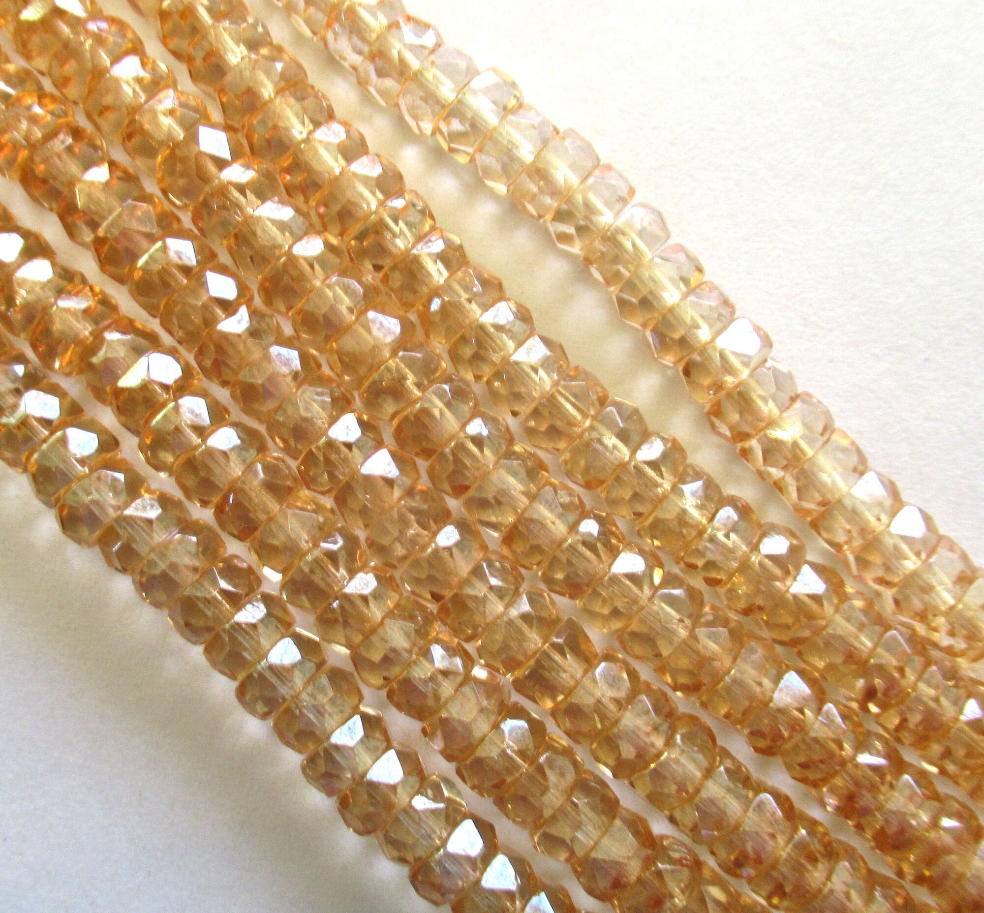 50 6 x 3mm Czech glass faceted rondelle beads - transparent luster champagne spacer beads - C00801