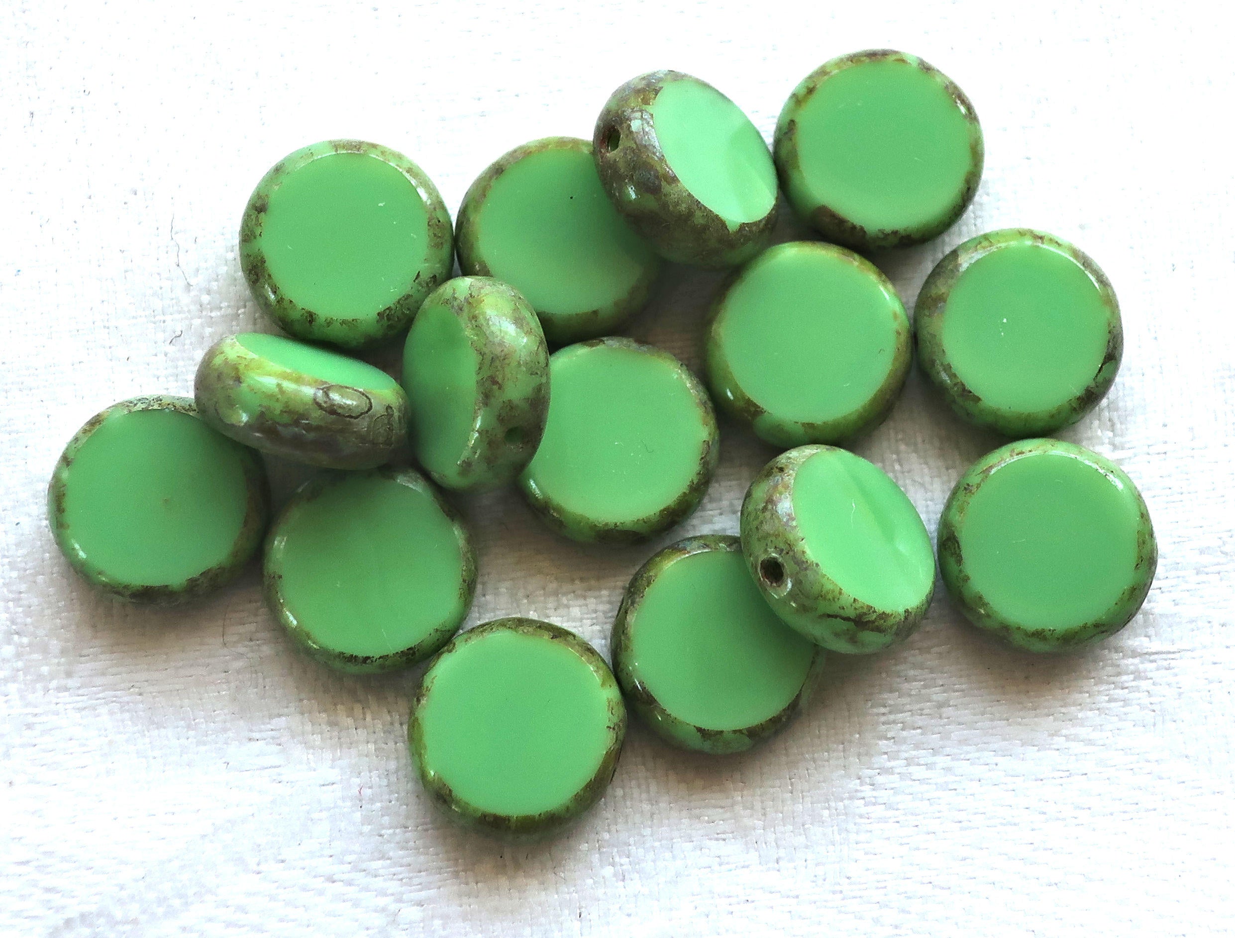 10 Czech glass green coin or disc beads - 11mm flat round beads - opaque light green table cut beads with a picasso finish 02201