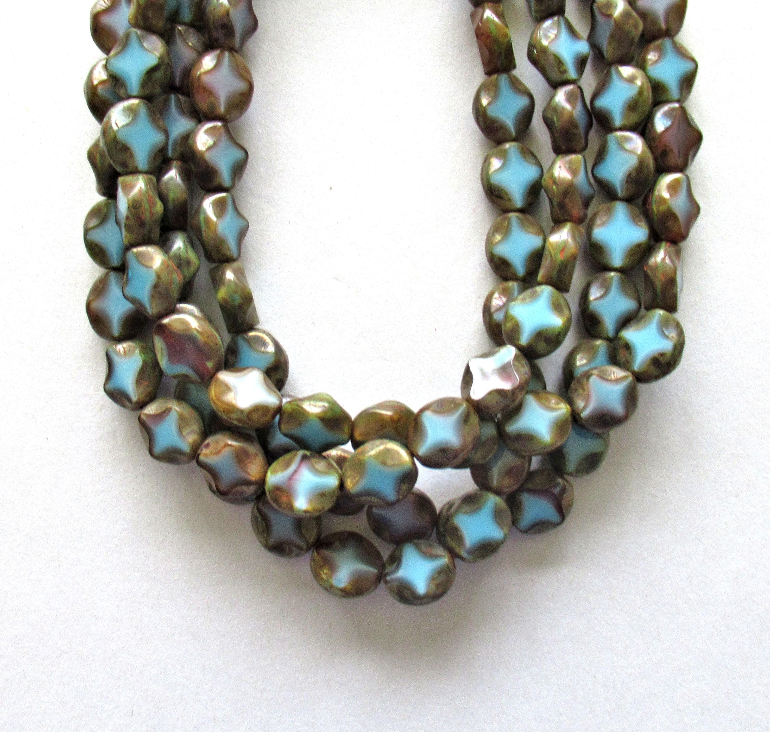 15 Czech glass oval beads - 9 x 8mm - blue w/ some purple & a Picasso finish - carved table cut beads with a diamond pattern - C0251