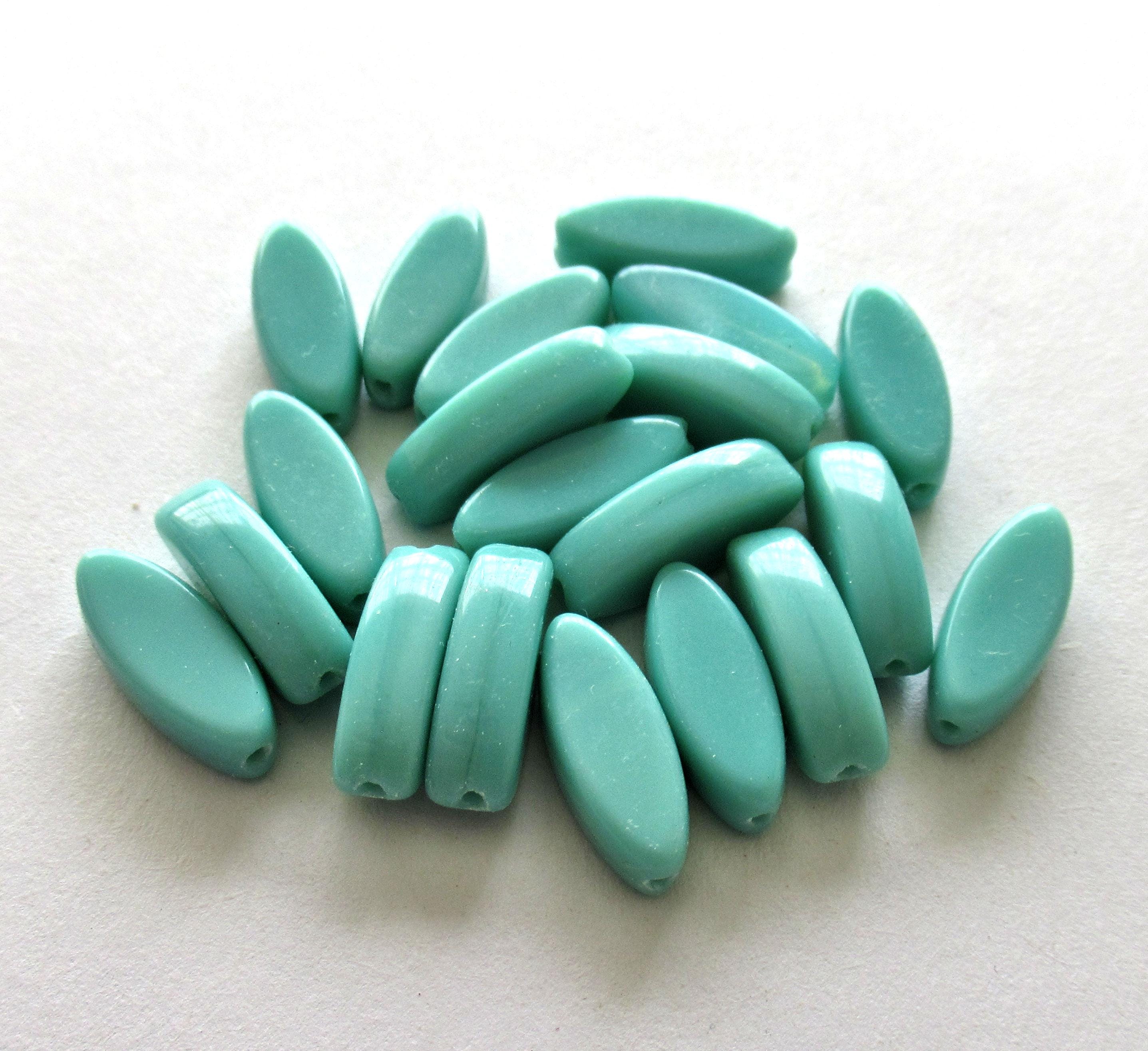 Ten Czech glass green spindle beads - 16 x 6mm - opaque light turquoise green - oblong oval pressed glass beads - C0007