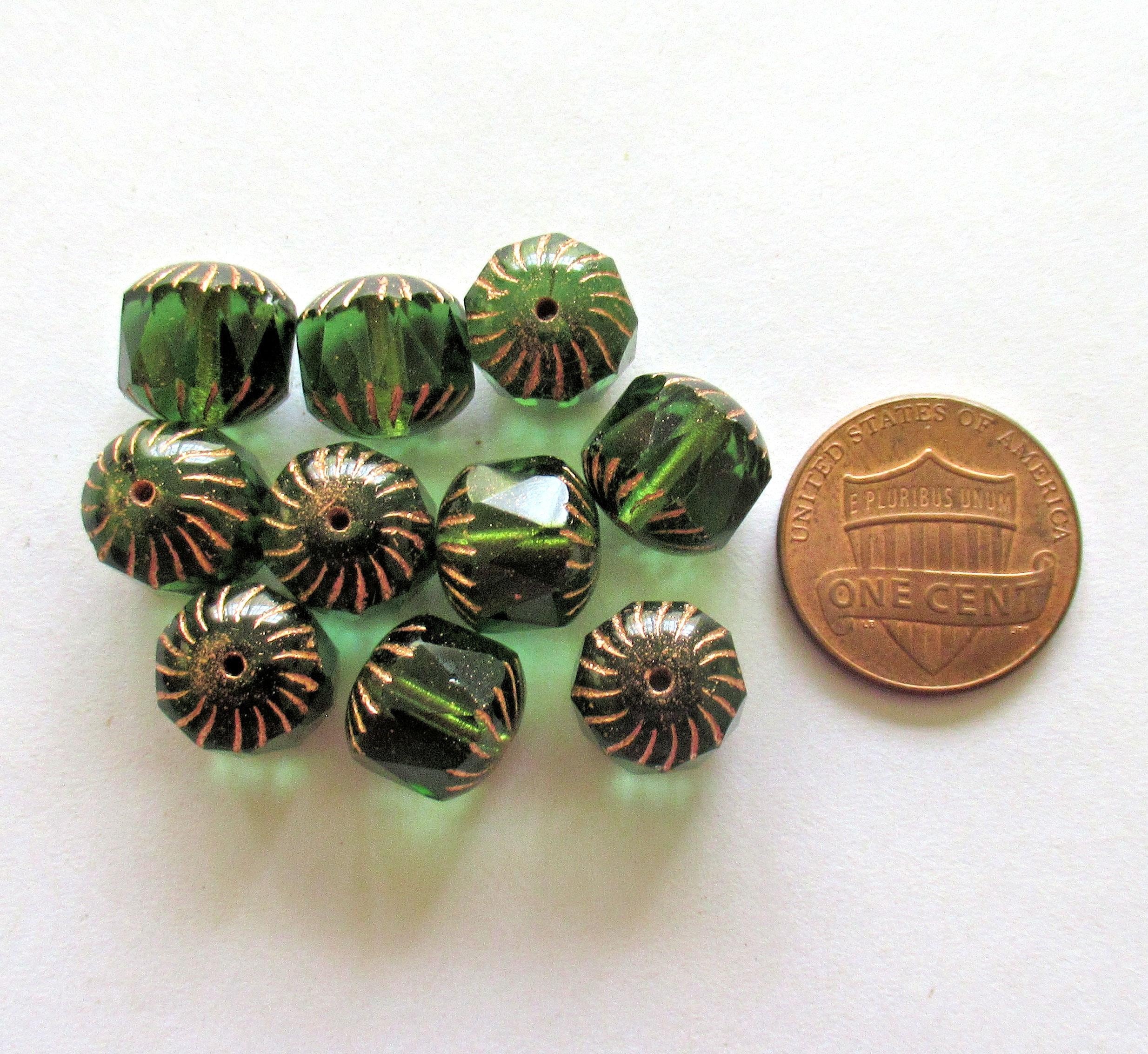 Ten large Czech glass center faceted carved cruller beads - 10mm - round transparent emerald green cathedral beads w/ copper accents - 00063