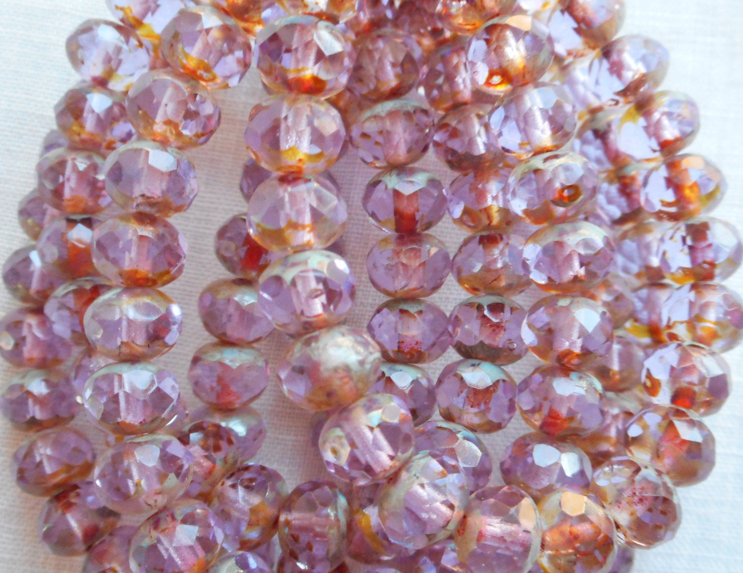 Lot of 25 Transparent light purple, lavender Picasso faceted puffy rondelle or donut beads, 5 x 7mm Czech glass beads C52201