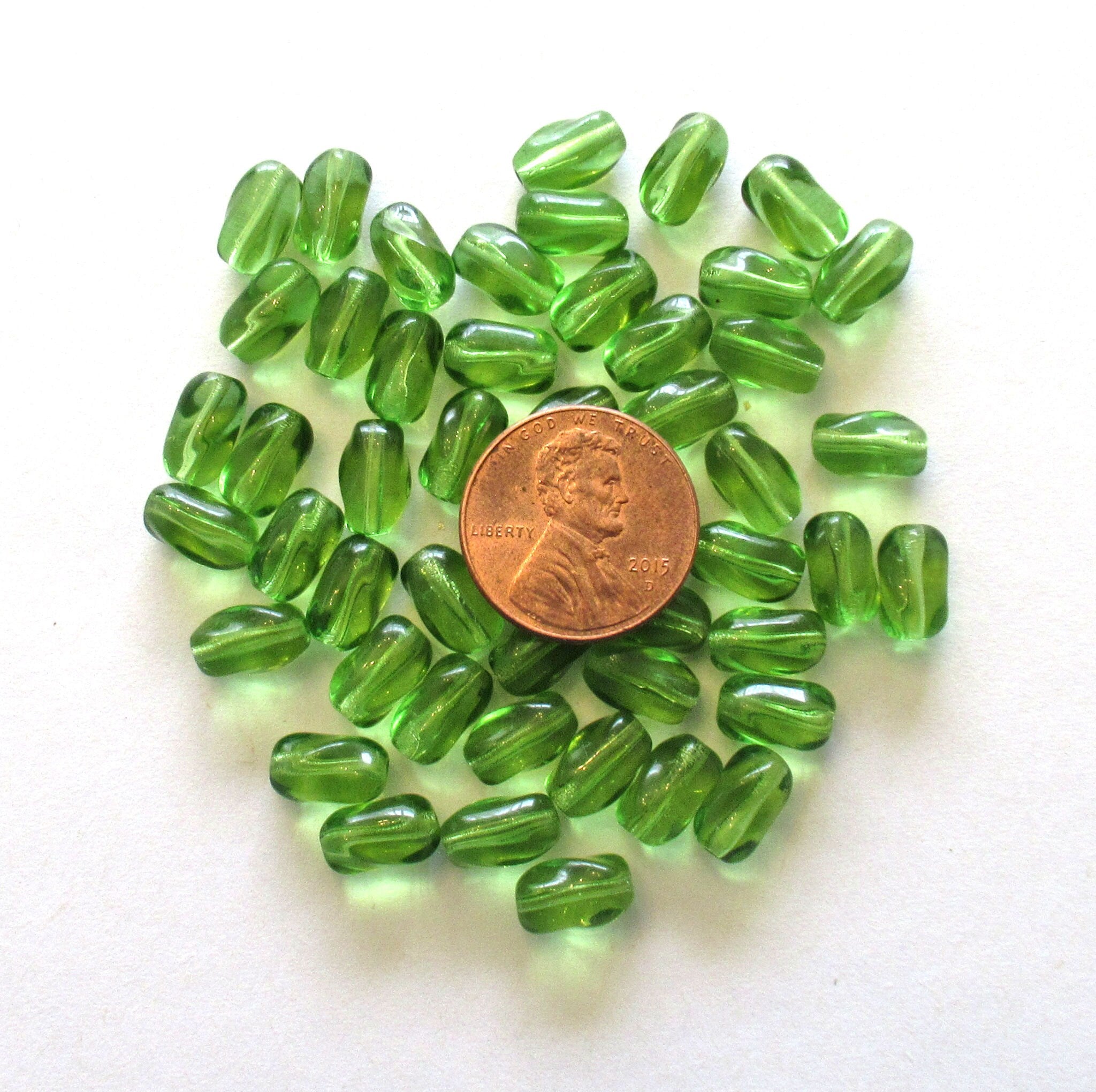 25 Czech glass beads - 9mm x 6mm olivine green glass twisted oval beads C0062