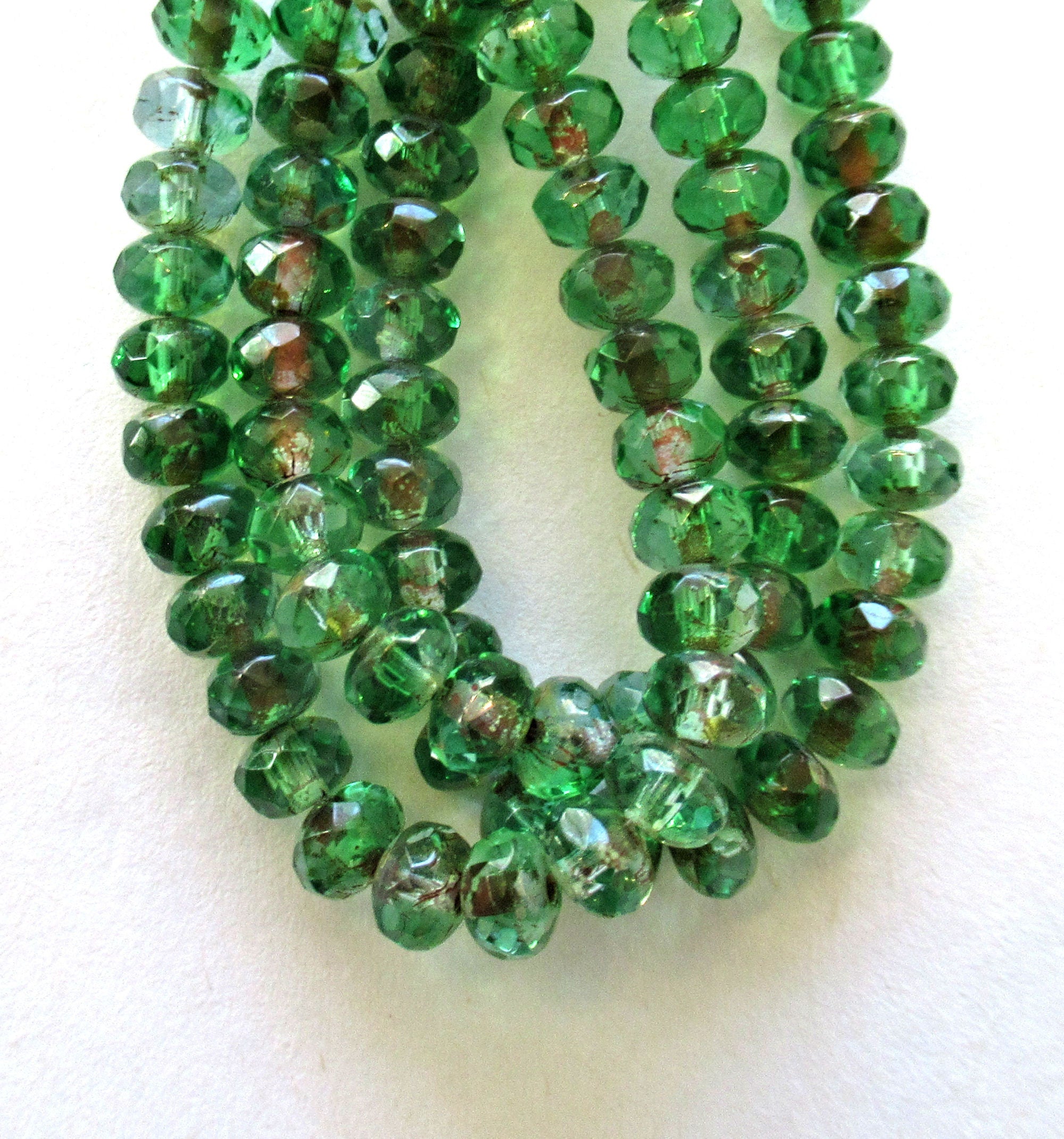 Lot of 30 small 3 x 5mm Czech glass puffy rondelle beads - transparent green & blue picasso faceted, fire polished puffy rondelles 0089