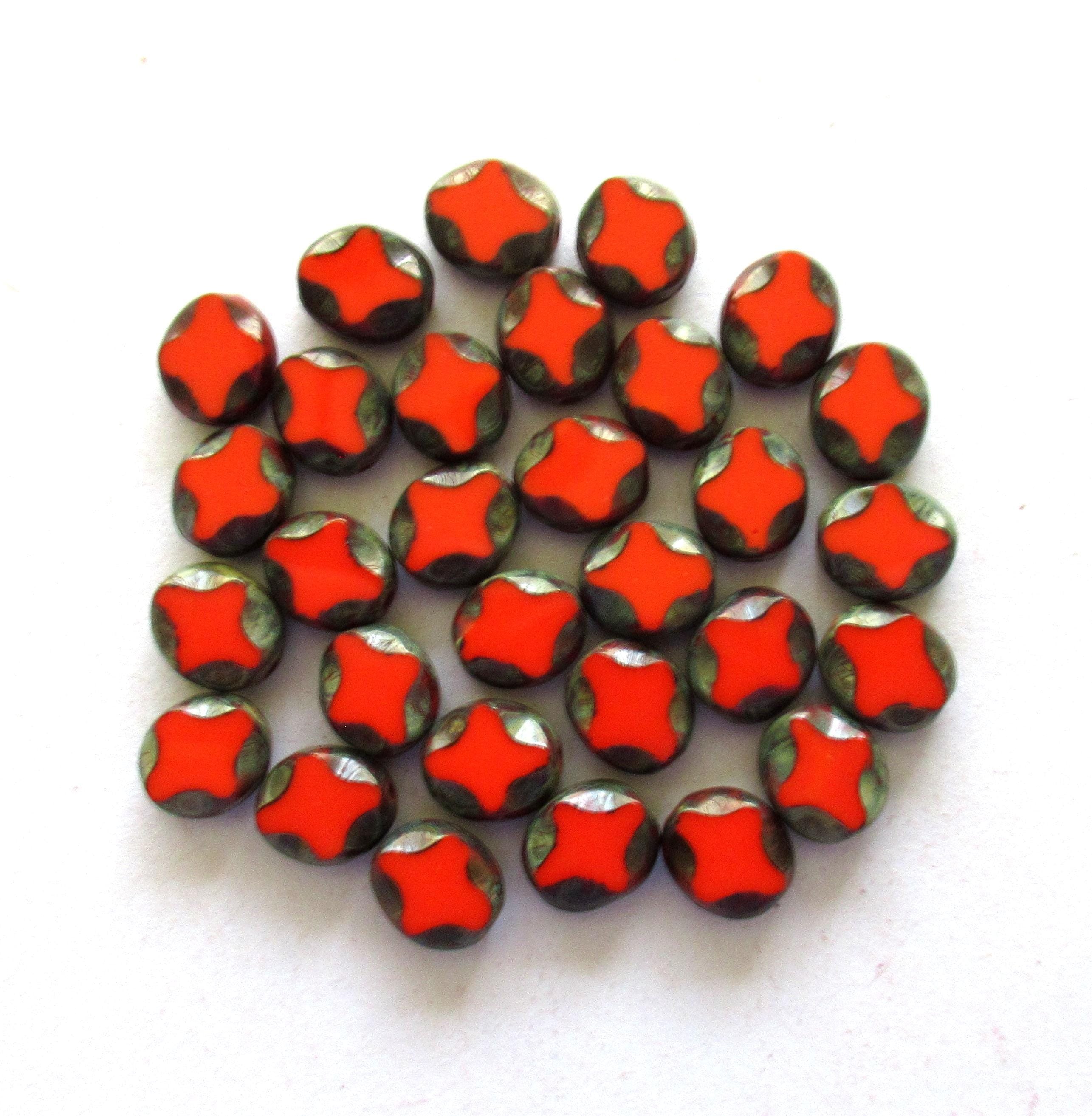 15 Czech glass oval beads - 9 x 8mm - coral red oval with a Picasso finish - carved table cut beads with a diamond pattern - C0251