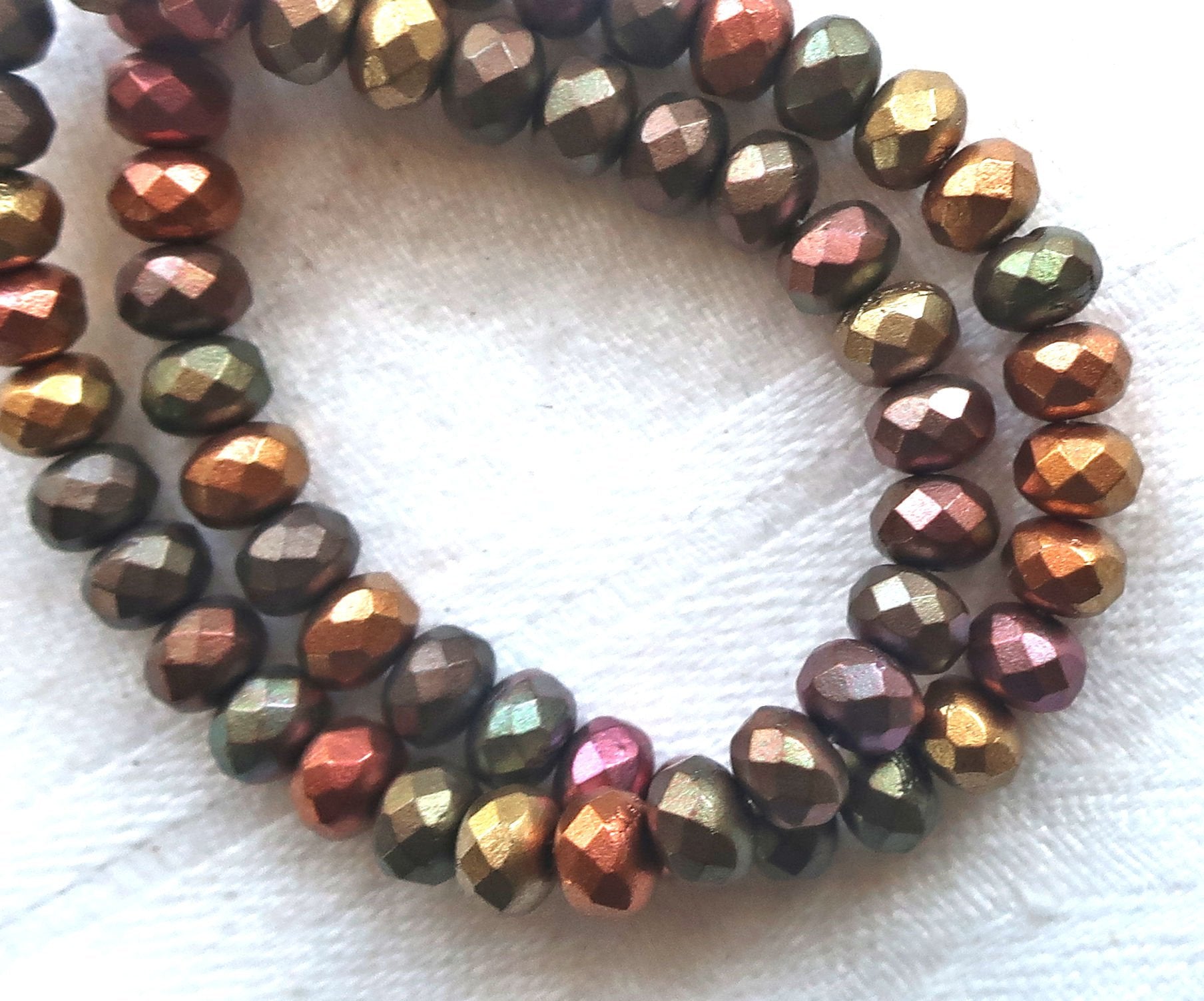 30 small puffy rondelle beads, opaque matte metallic mix earth tones, 3 x 5mm faceted Czech glass rondelles C53101