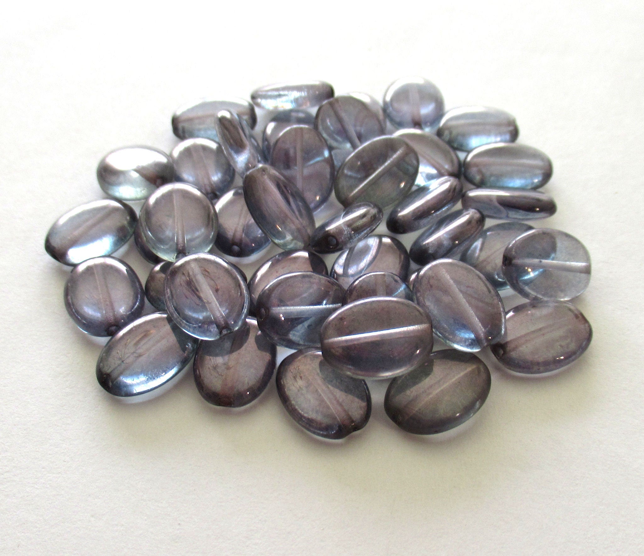25 Czech glass flat oval beads - lumi blue beads with a light Iridescent purple finish - 12mm x 9mm pressed glass beads C0076
