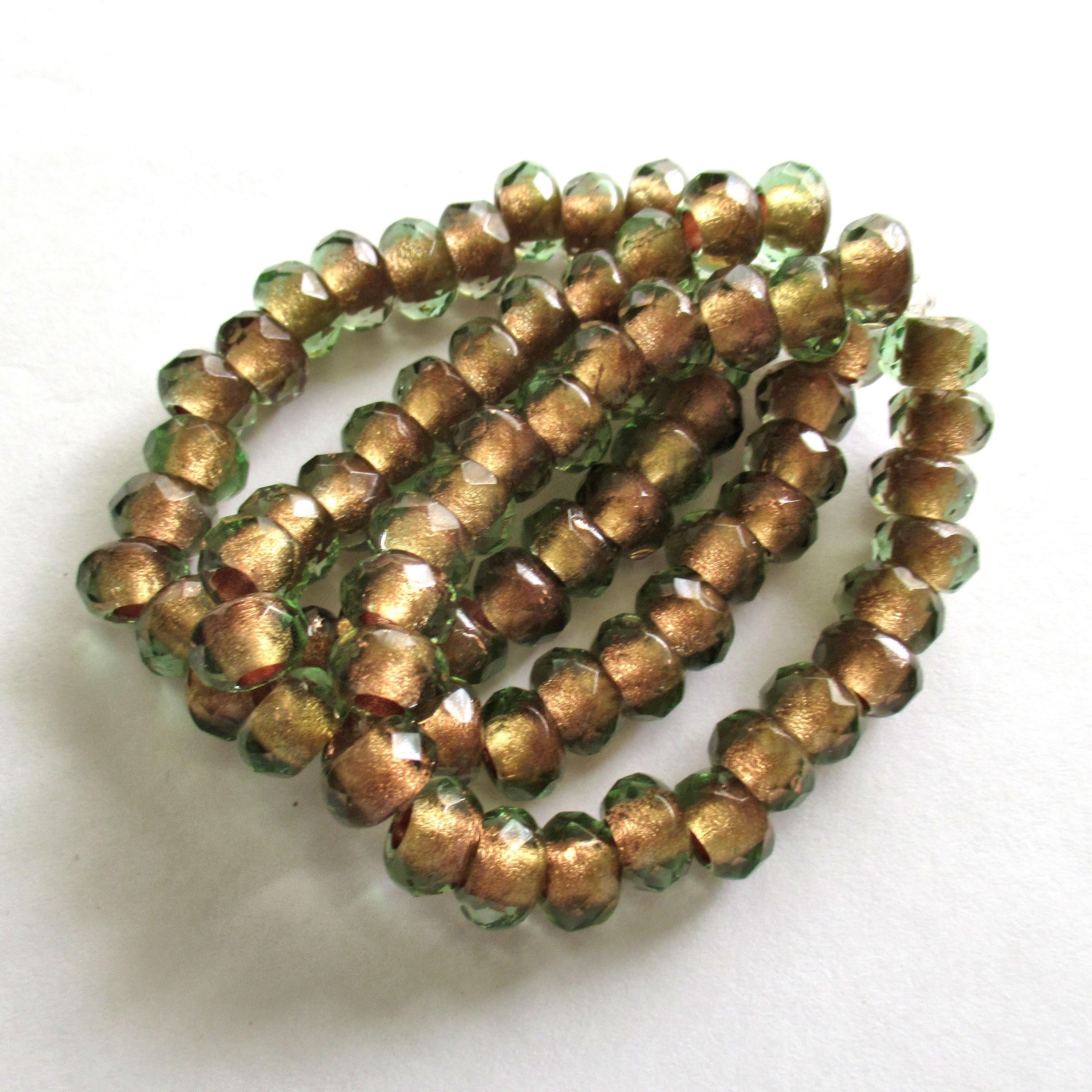 Ten Czech glass roller beads - 9 x 6mm - light green copper lined - faceted - big 3.5mm hole roller - rondelle - donut beads C00911