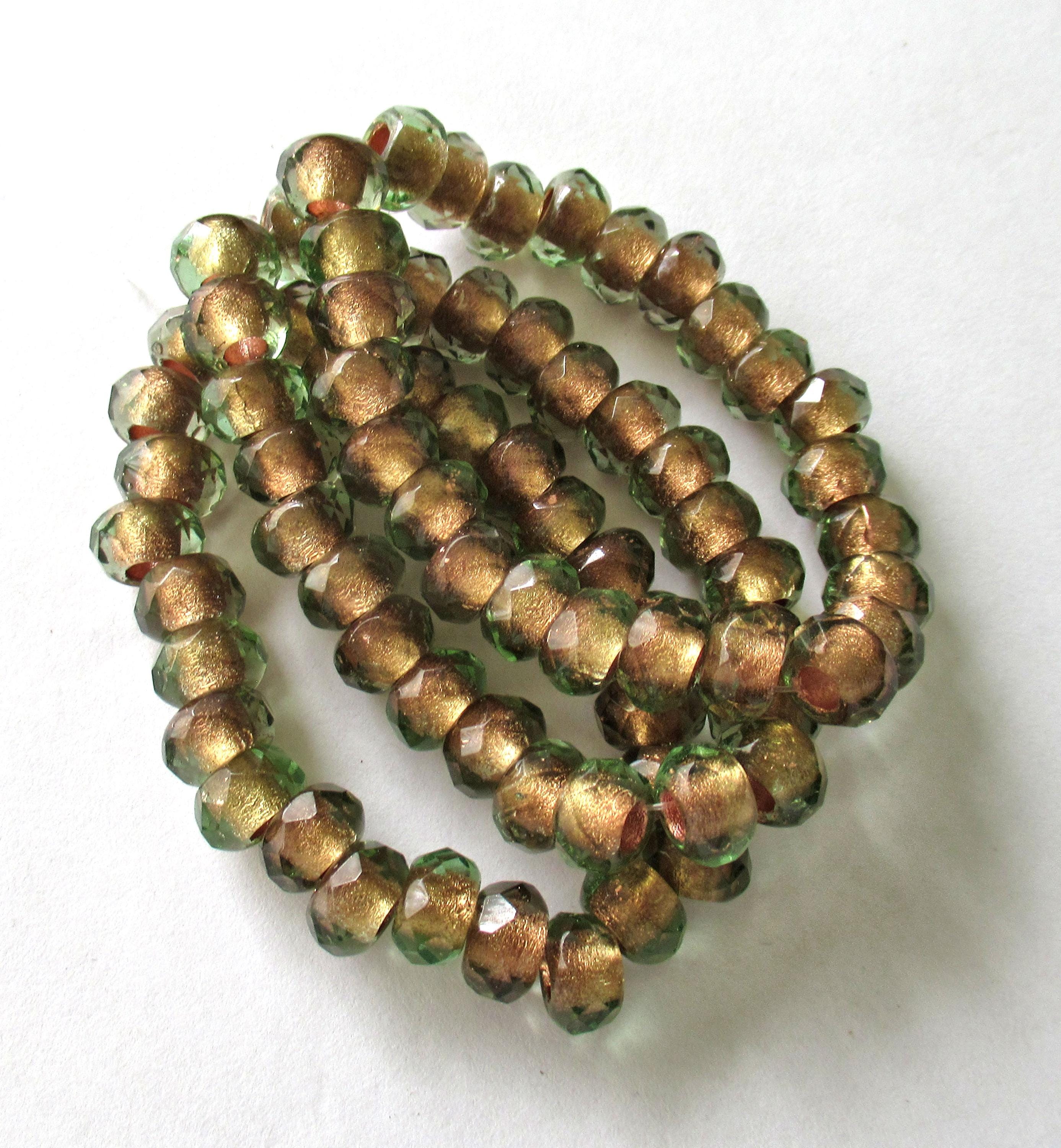 Ten Czech glass roller beads - 9 x 6mm - light green copper lined - faceted - big 3.5mm hole roller - rondelle - donut beads C00911