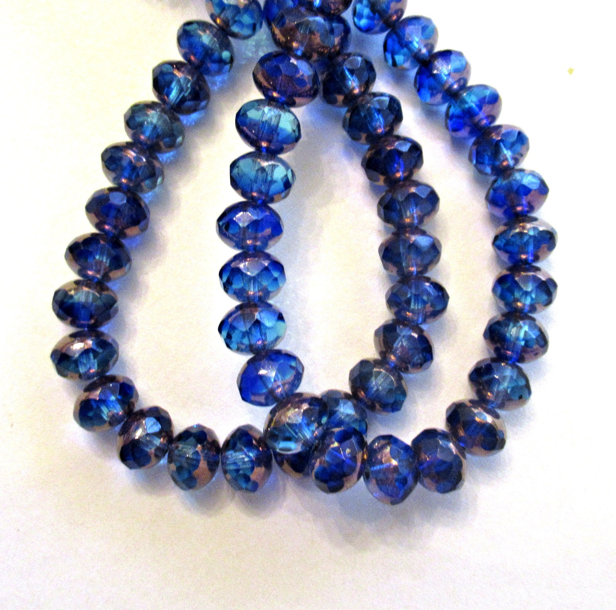 Lot of 25 faceted Czech glass puffy rondelle beads - 5 x 7mm transparent aqua and sapphire blue mix - rondelles 500851