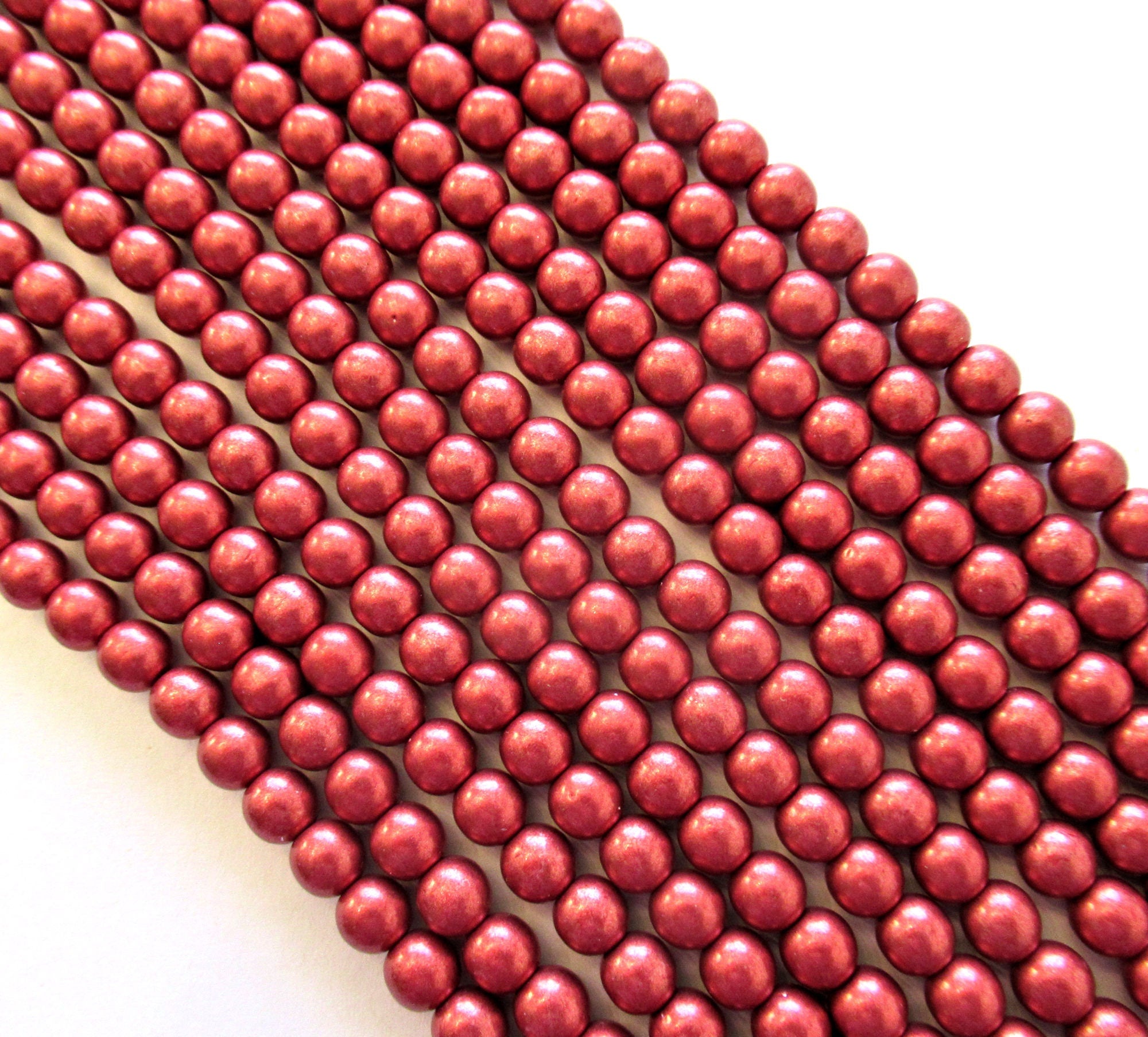 Fifty 6mm Czech glass druk beads - opaque matte metallic cranberry red smooth round druks - C0037