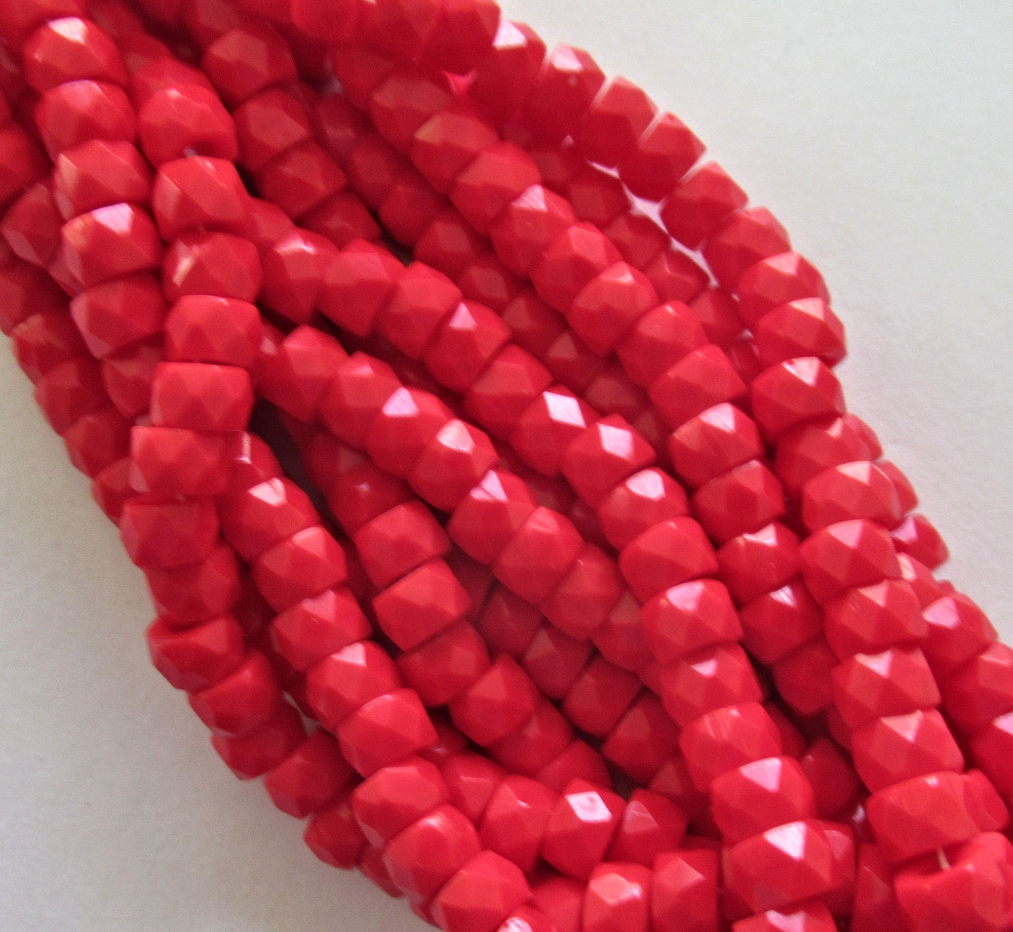 Lot of 50 6mm Czech glass faceted pony, roller or crow beads - bright opaque red large hole, fire polished beads C00211
