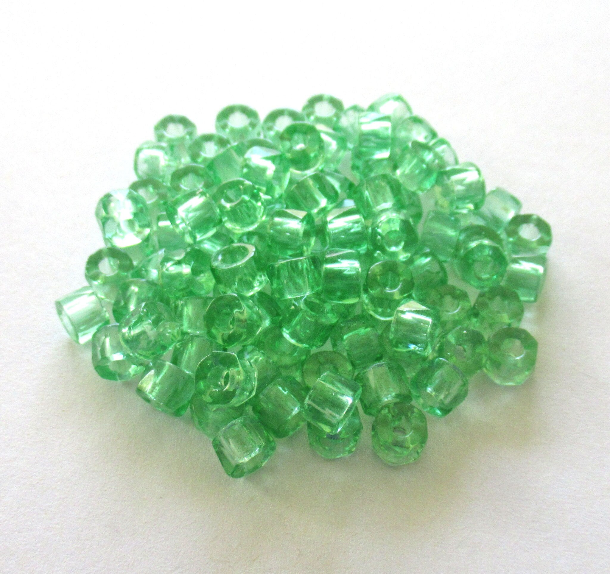 Fifty 6mm faceted mint green Czech glass pony roller beads - large hole crow beads - C00831