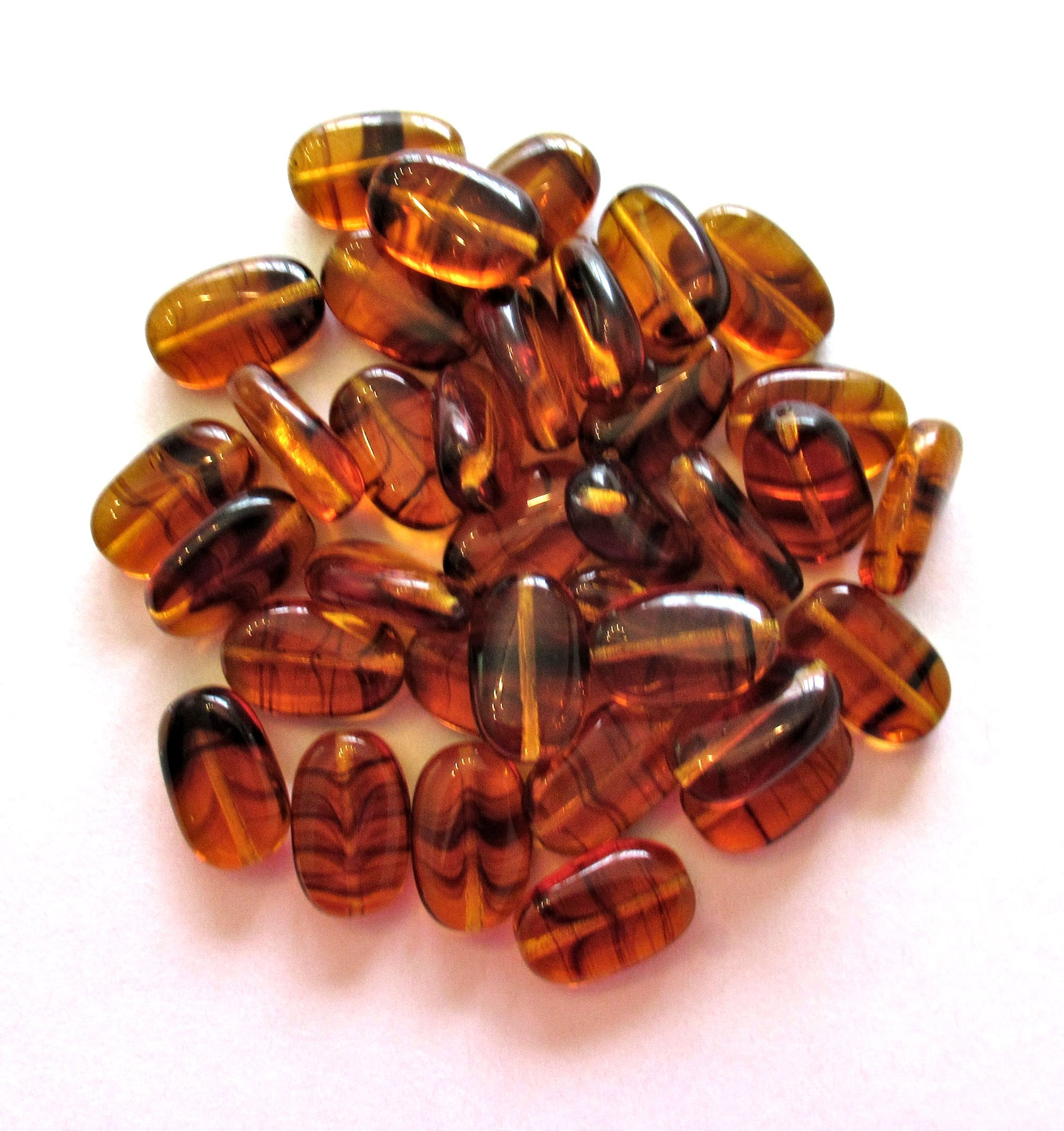 Lot of 15 slightly twisted oval Czech glass beads - 14mm x 8mm tortoise - tortoiseshell - pressed glass beads C0089