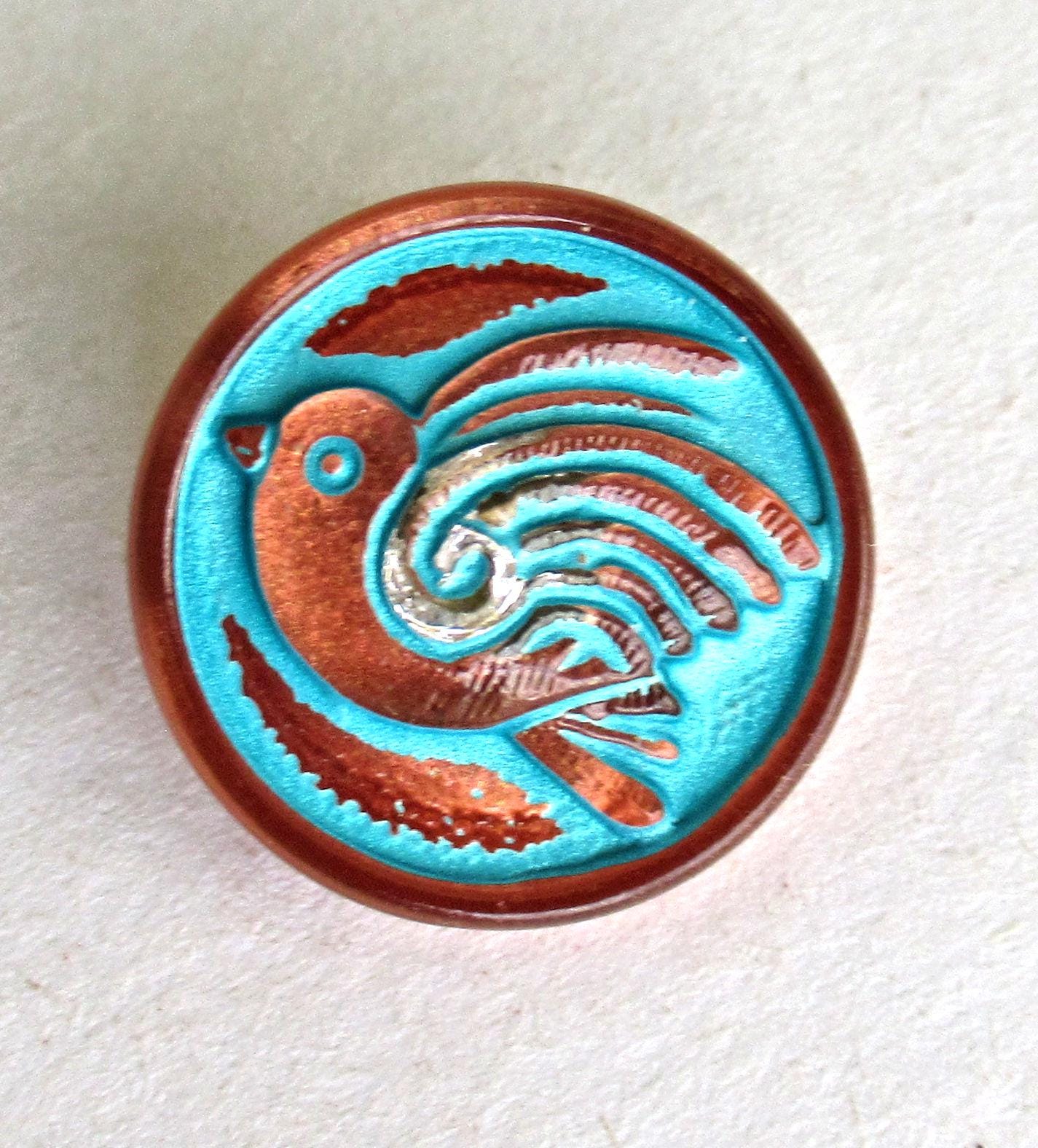 One 18mm Czech glass bird button - copper with a turquoise wash - decorative shank buttons - 000572