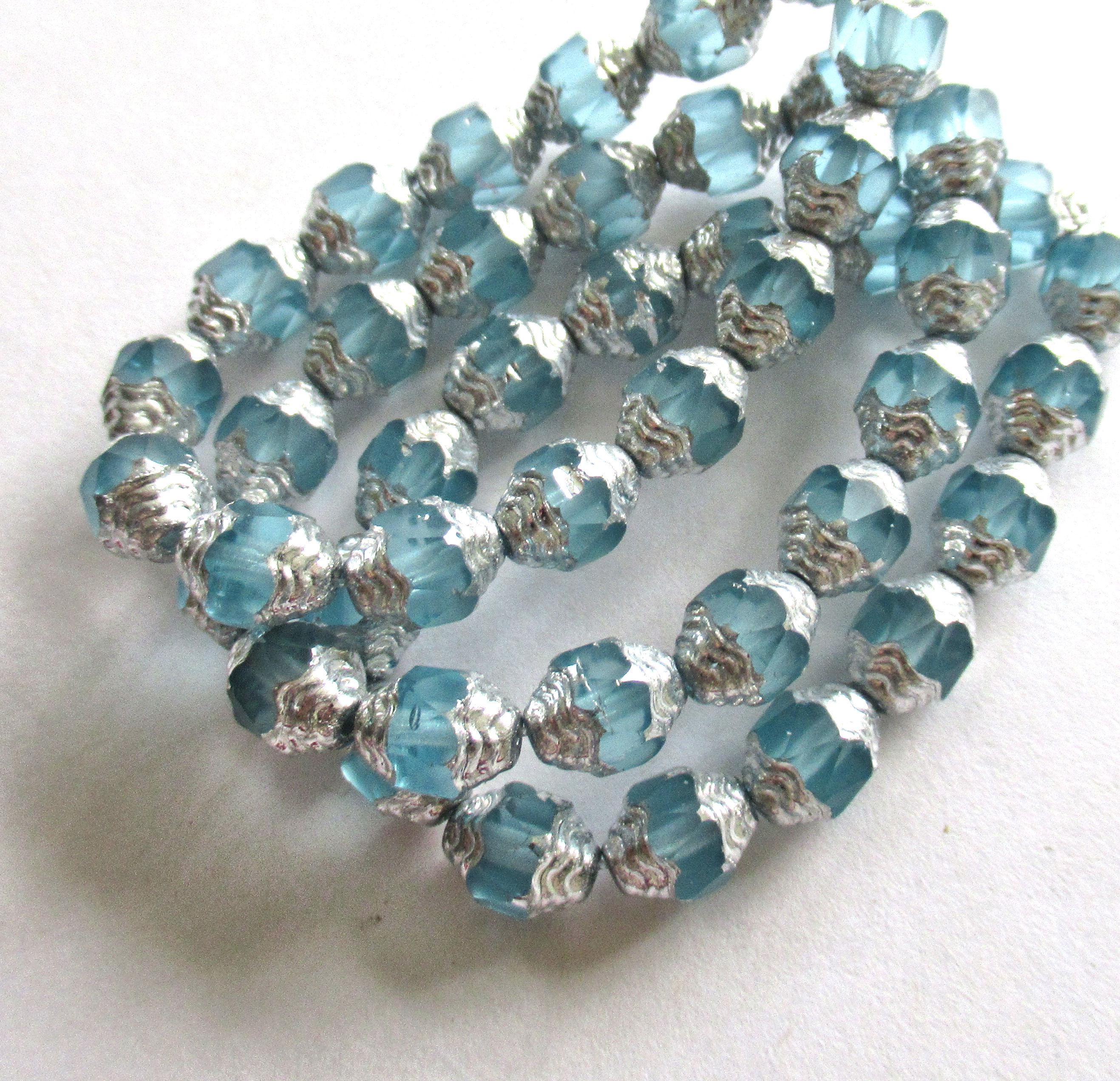 15 Czech glass mini antique style faceted oval cathedral beads - 8 x 6mm matte ice blue with silver accents - C00071