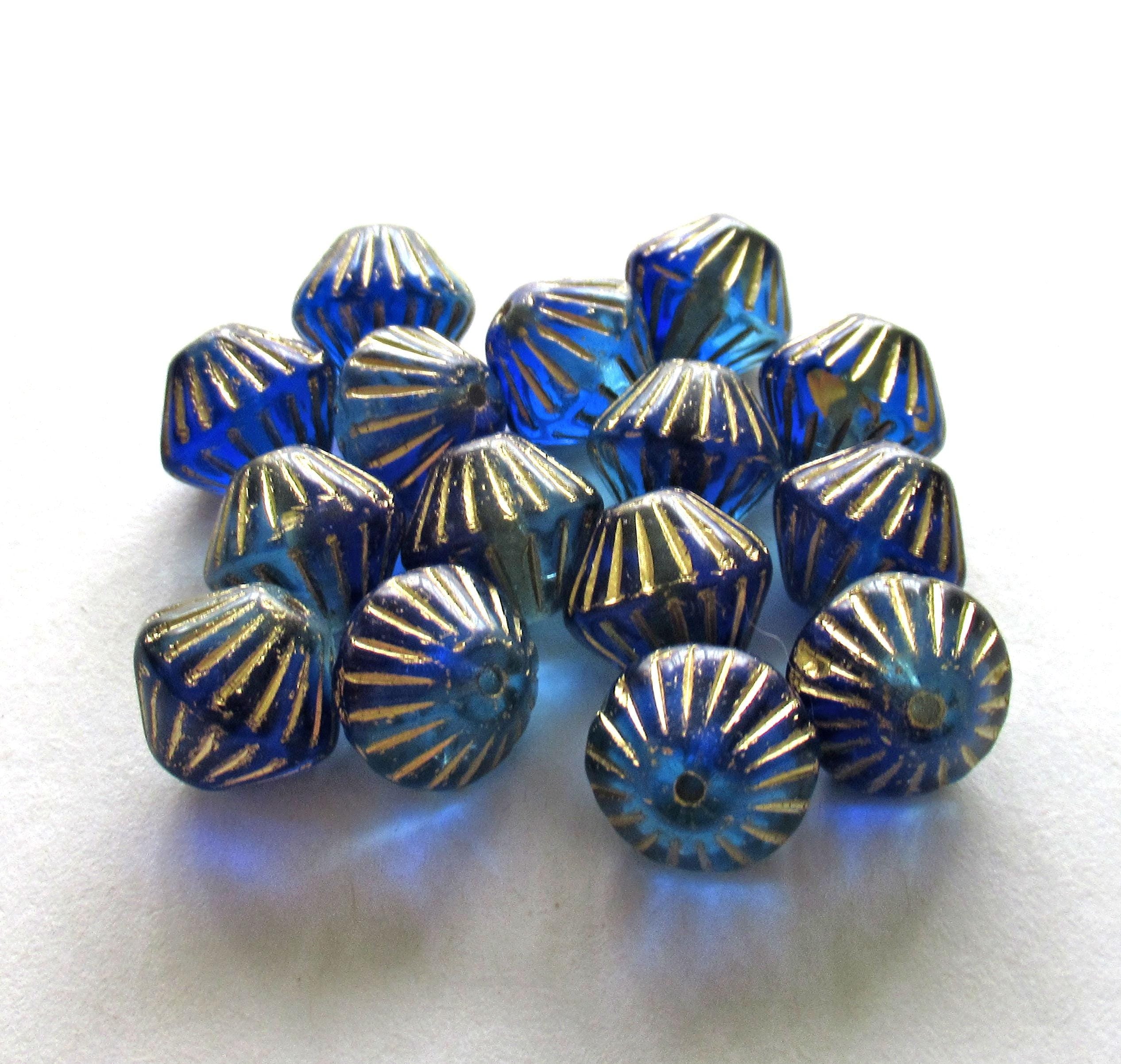Five Czech glass bicones - 11mm x 10mm - sapphire & aqua blue mix with gold accents - carved chunky rustic bicone beads - C0057