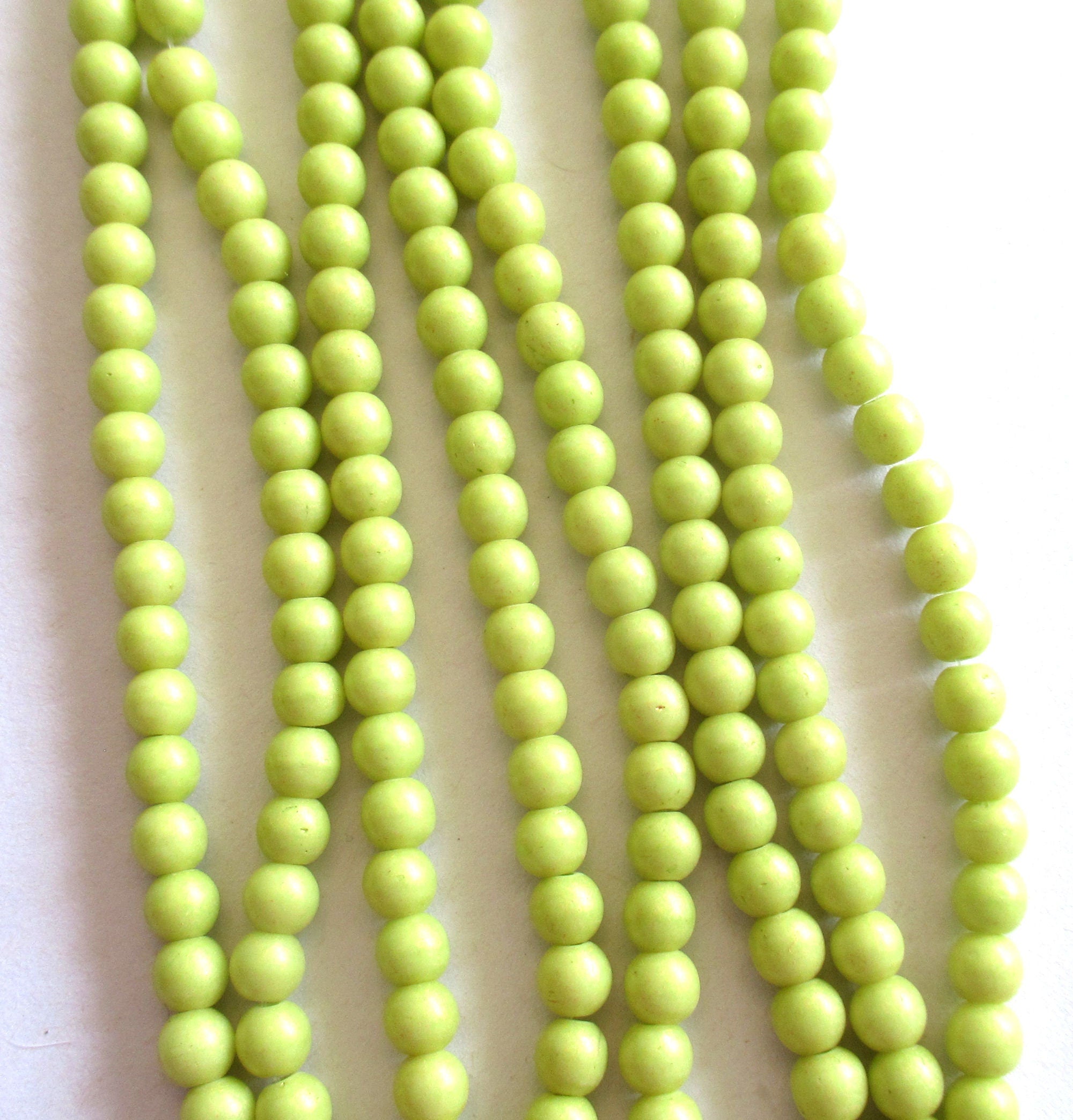 100 4mm Czech glass druk beads - Pacifica Honeydew - opaque light green smooth round druks - C0067